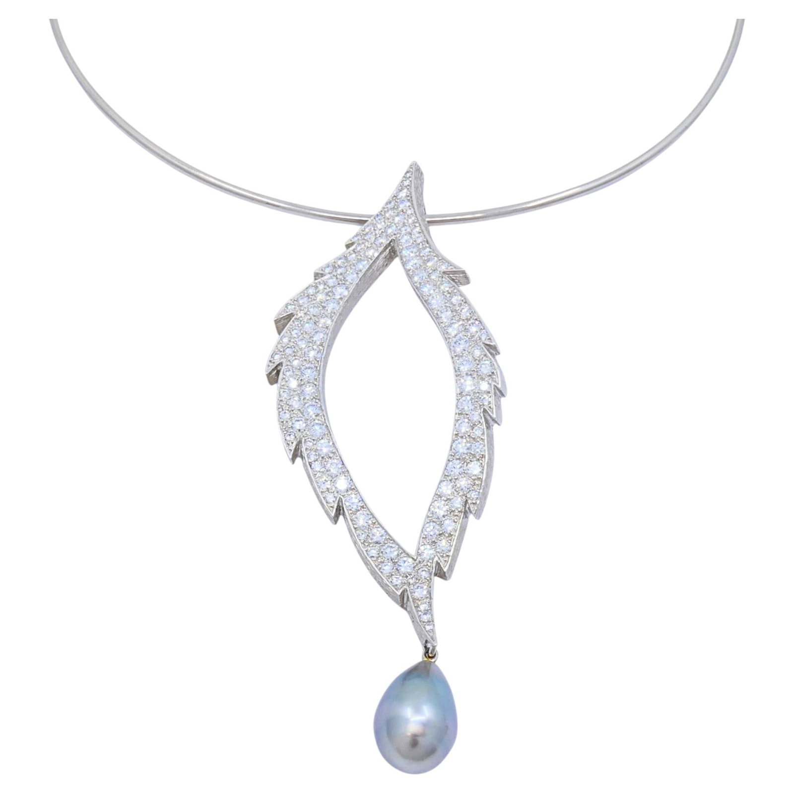 Grima leaf pendant brooch set of 2 in 18k white gold with diamonds pearl: Grima leaf pendant brooch set of 2 in 18k white gold with diamonds pearl Convertible Grima necklace and brooch set featuring a stylized leaf design fully set with round brilliant-cut diamonds and fini