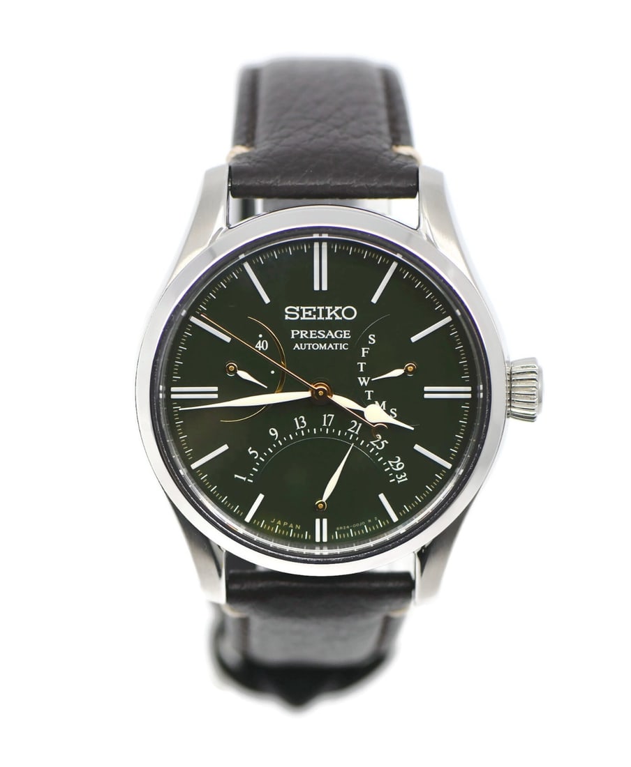 Seiko Presage SPB295J1 men's automatic wristwatch with box papers: Seiko Presage SPB295J1 men's automatic wristwatch with box papers This Seiko Presage wristwatch features a round stainless steel case with a silver finish, a green dial, and an analog display. It has 