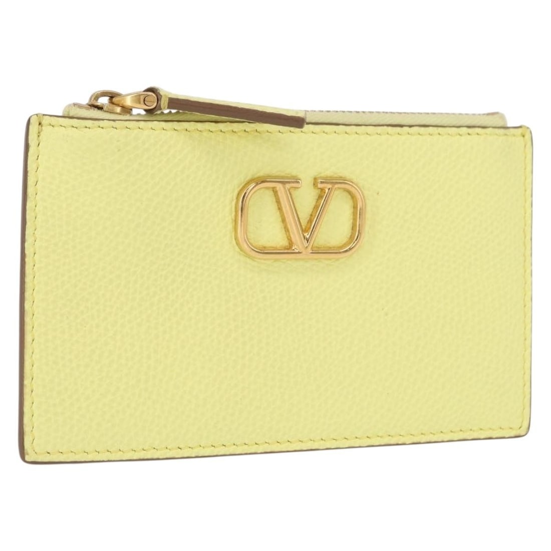 Gold Yellow Leather Coin Purse by Valentino with Dust Bag: Gold Yellow Leather Coin Purse by Valentino with Dust Bag This Valentino coin purse is crafted from leather in a gold and yellow color combination. Made in Italy, it features a compact design suitable