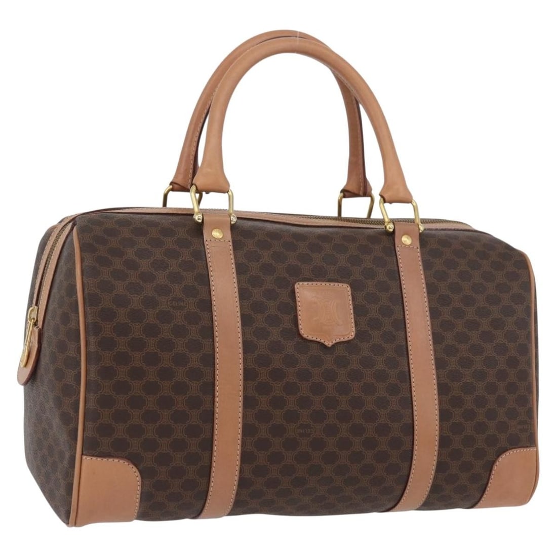 Celine Macadam Brown PVC Canvas Handbag with Gold Accents and Dust Bag: Celine Macadam Brown PVC Canvas Handbag with Gold Accents and Dust Bag This CELINE Macadam Canvas Hand Bag features a brown and gold color scheme with PVC leather and signature Macadam canvas exterior