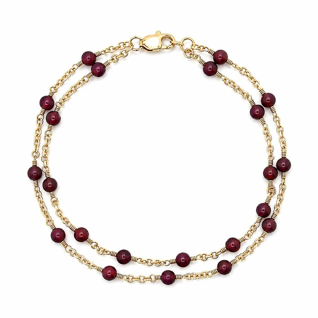 Unbranded 14k Yellow Gold 2 Strand Rhodolite Garnet Bead Bracelet: Unbranded 14k Yellow Gold 2 Strand Rhodolite Garnet Bead Bracelet Vintage dual strand bracelet crafted in solid 14k yellow gold and set with natural rhodolite garnet round beads. This beaded bracelet 
