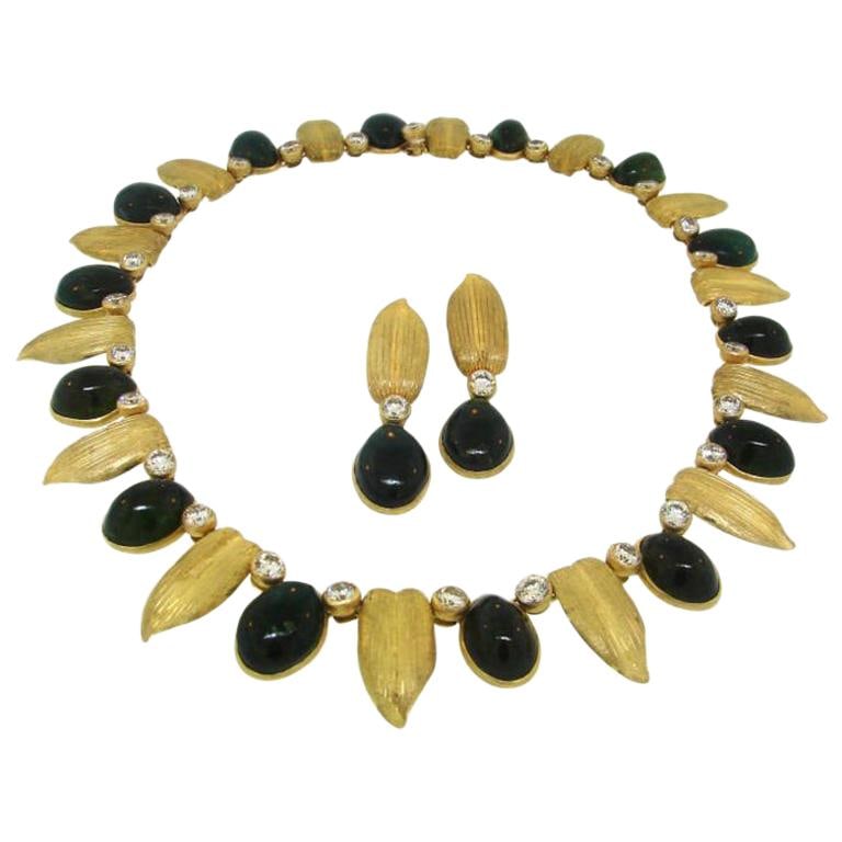 Buccellati 18k Gold Necklace and Earrings Set with Diamond Tourmaline: Buccellati 18k Gold Necklace and Earrings Set with Diamond Tourmaline Vintage Buccellati jewelry set from the 1960s, consisting of a necklace and a pair of earrings. Crafted in 18k yellow gold, this s
