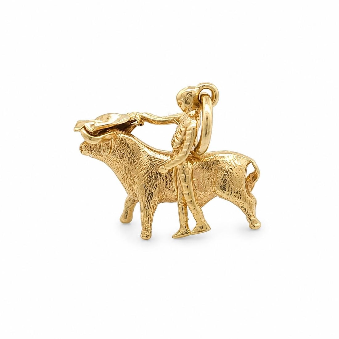 Vintage Unbranded Yellow Gold Matador Bull Charm Pendant: Vintage Unbranded Yellow Gold Matador Bull Charm Pendant Vintage collectible charm pendant featuring a detailed matador and bull design. Crafted in solid yellow gold with a 14k yellow gold jump ring, 