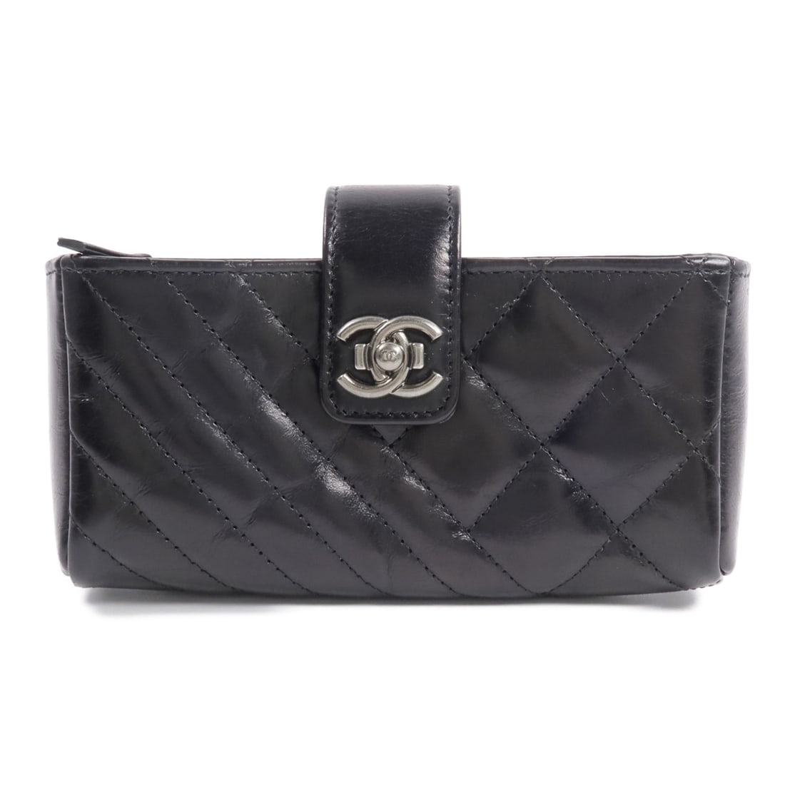 CHANEL O-Mini calfskin coin purse and phone pouch black: CHANEL O-Mini calfskin coin purse and phone pouch black Compact Chanel O-Mini phone pouch and coin case crafted in black calfskin leather. Designed for women, this coin purse features a magnetic pocke