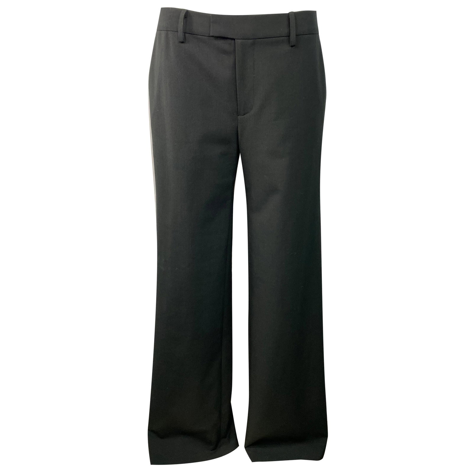 Nili Lontan wool pants black wide leg with side button slits: Nili Lontan wool pants black wide leg with side button slits Black wool wide leg trousers by Nili Lontan, made in the United States. They feature a wide leg design with side slits and button detail. C