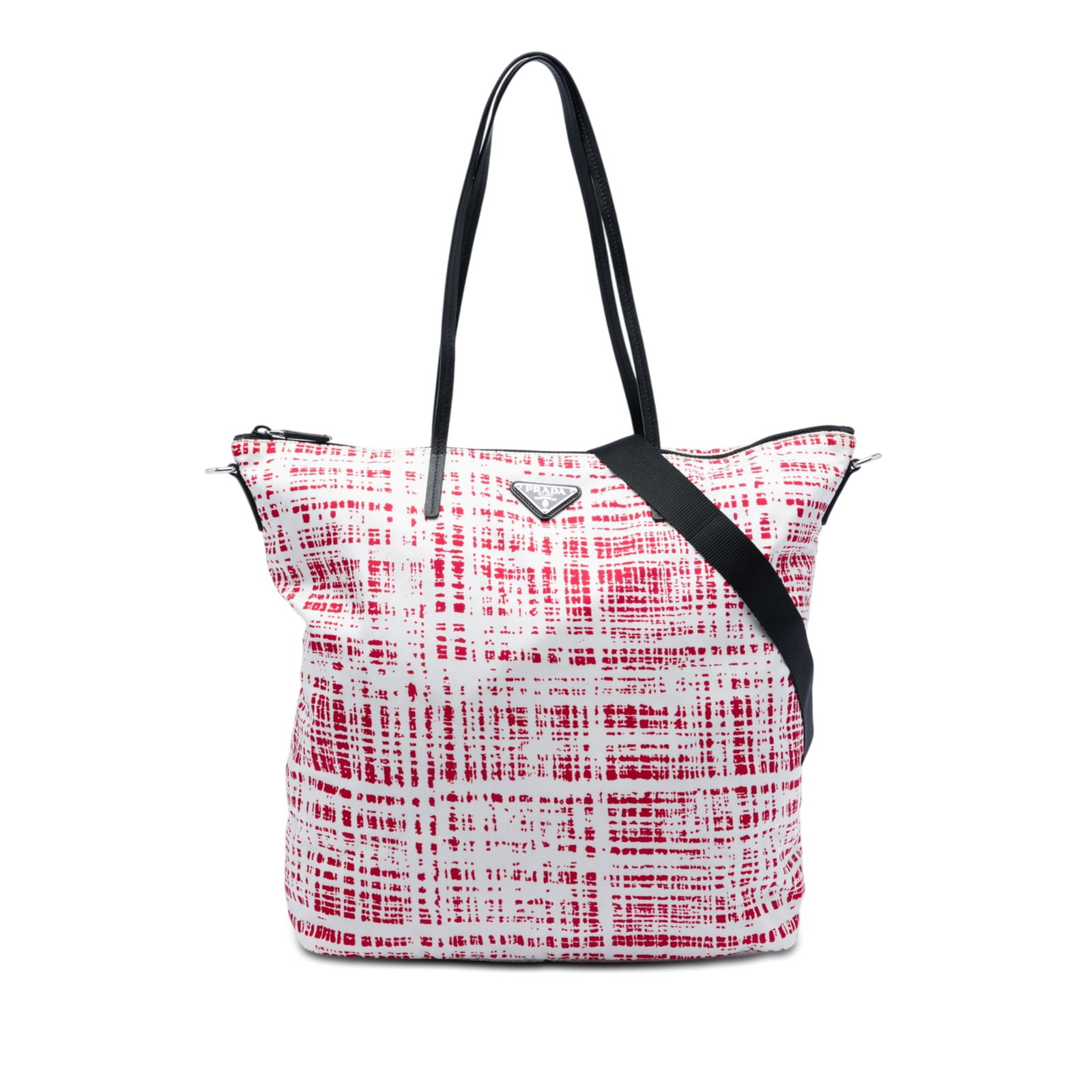Prada Tessuto Stampato Red Nylon Satchel Bag: Prada Tessuto Stampato Red Nylon Satchel Bag Prada Tessuto Stampato satchel in red printed nylon with flat saffiano leather handles and a detachable flat nylon strap. The bag features a top zip closur