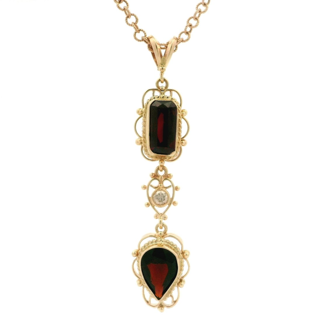 Vintage 14k Yellow Gold Garnet Diamond Lavalier Pendant with Rose Gold Chain: Vintage 14k Yellow Gold Garnet Diamond Lavalier Pendant with Rose Gold Chain This exquisite vintage pendant showcases a stunning combination of garnet and diamond set in solid 14k yellow gold, complem