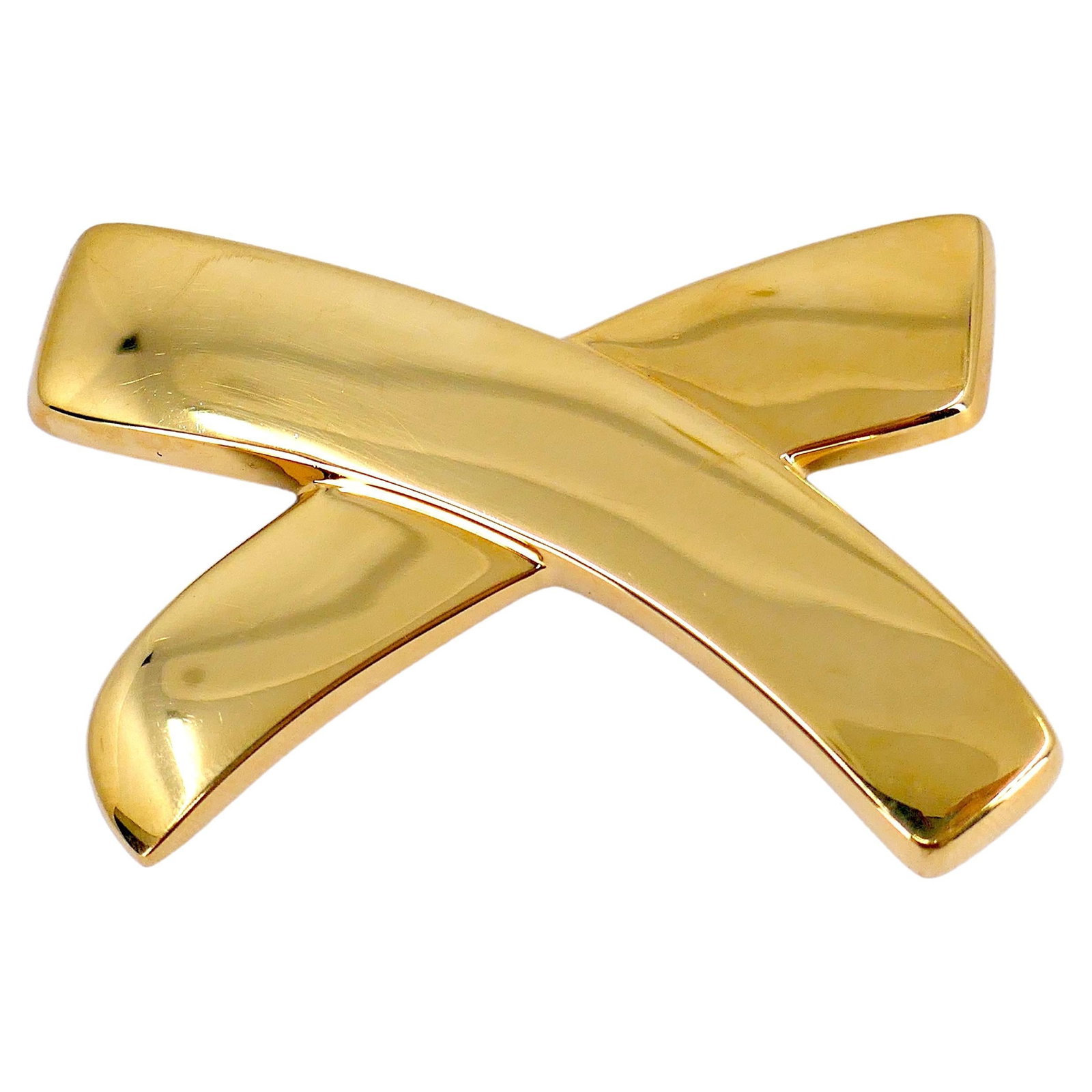 Tiffany Co Paloma Picasso Love Kisses 18K Yellow Gold X Brooch: Tiffany Co Paloma Picasso Love Kisses 18K Yellow Gold X Brooch A Tiffany & Co. Love & Kisses brooch by Paloma Picasso in 18K yellow gold, featuring a bold large X motif. Crafted in the Paloma Picasso 