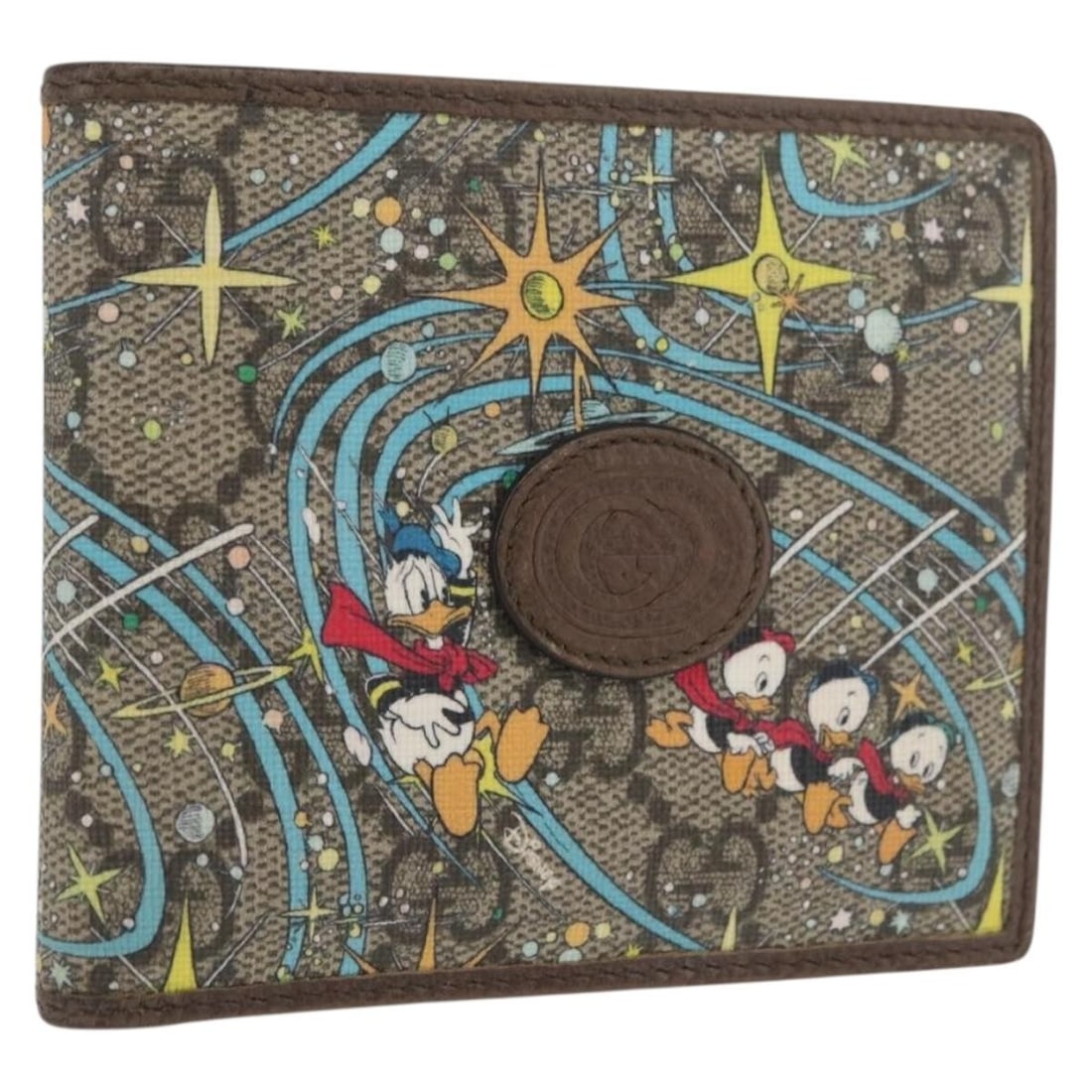 Gucci 647937 Donald Duck Disney GG Supreme Beige Wallet: Gucci 647937 Donald Duck Disney GG Supreme Beige Wallet Gucci x Disney collaboration wallet featuring a Donald design in beige GG Supreme canvas with PVC leather trim. Made in Italy, this women's wall