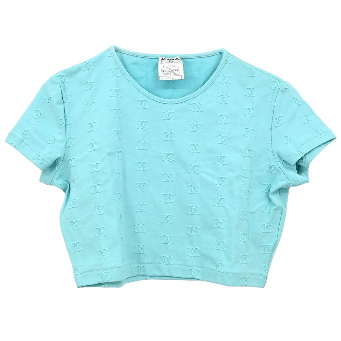 Vintage Chanel 97P light blue cropped short sleeve top 42: Vintage Chanel 97P light blue cropped short sleeve top 42 Vintage Chanel cropped T-shirt top in light blue with a regular fit and round neckline. This women's short-sleeve top is made in France from a