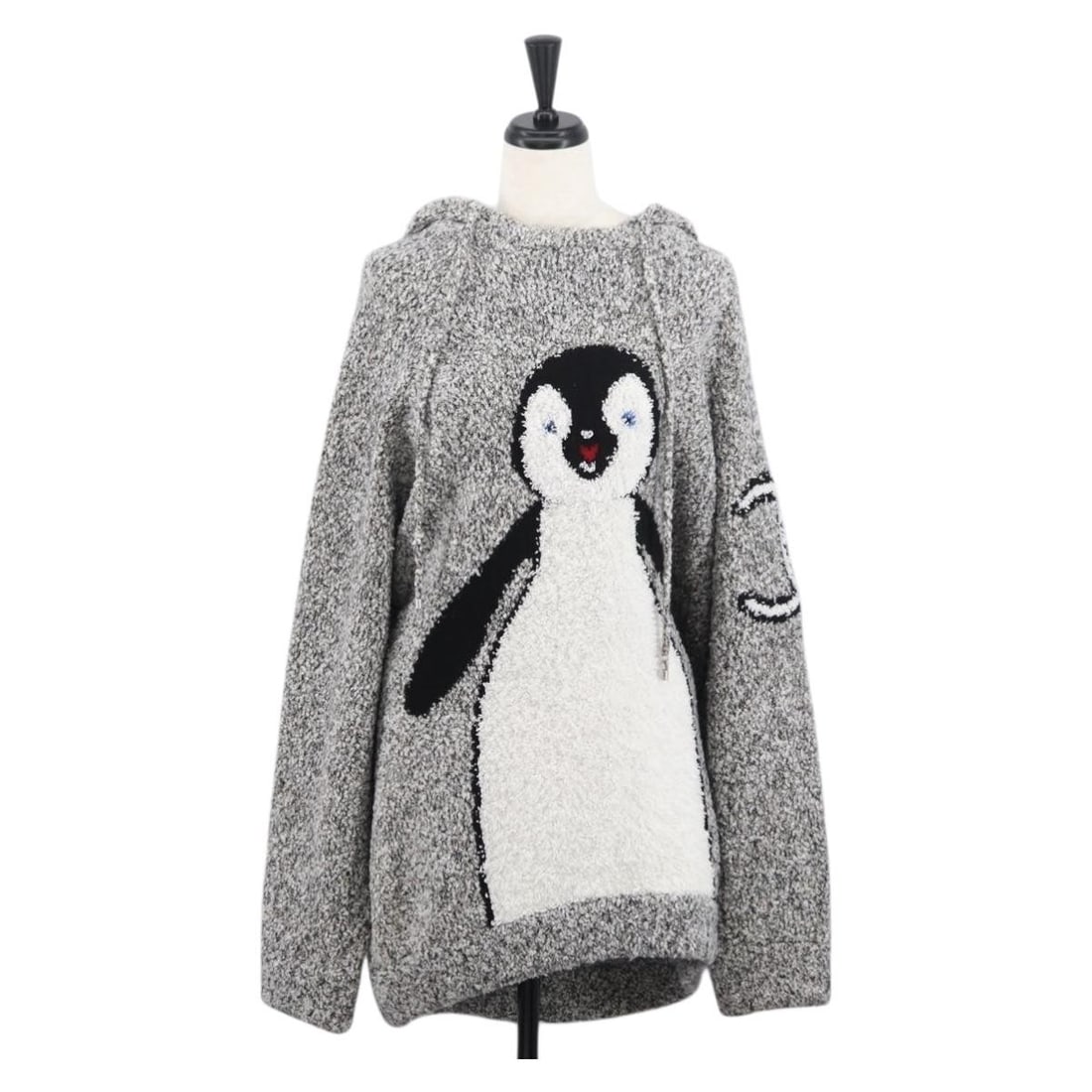 Chanel Gray Leather Jacket with 26.4 Inch Sleeves for Women: Chanel Gray Leather Jacket with 26.4 Inch Sleeves for Women This CHANEL women's jacket features a stylish penguin knit hoodie design crafted in gray leather. Made in Italy, it showcases signature CHAN