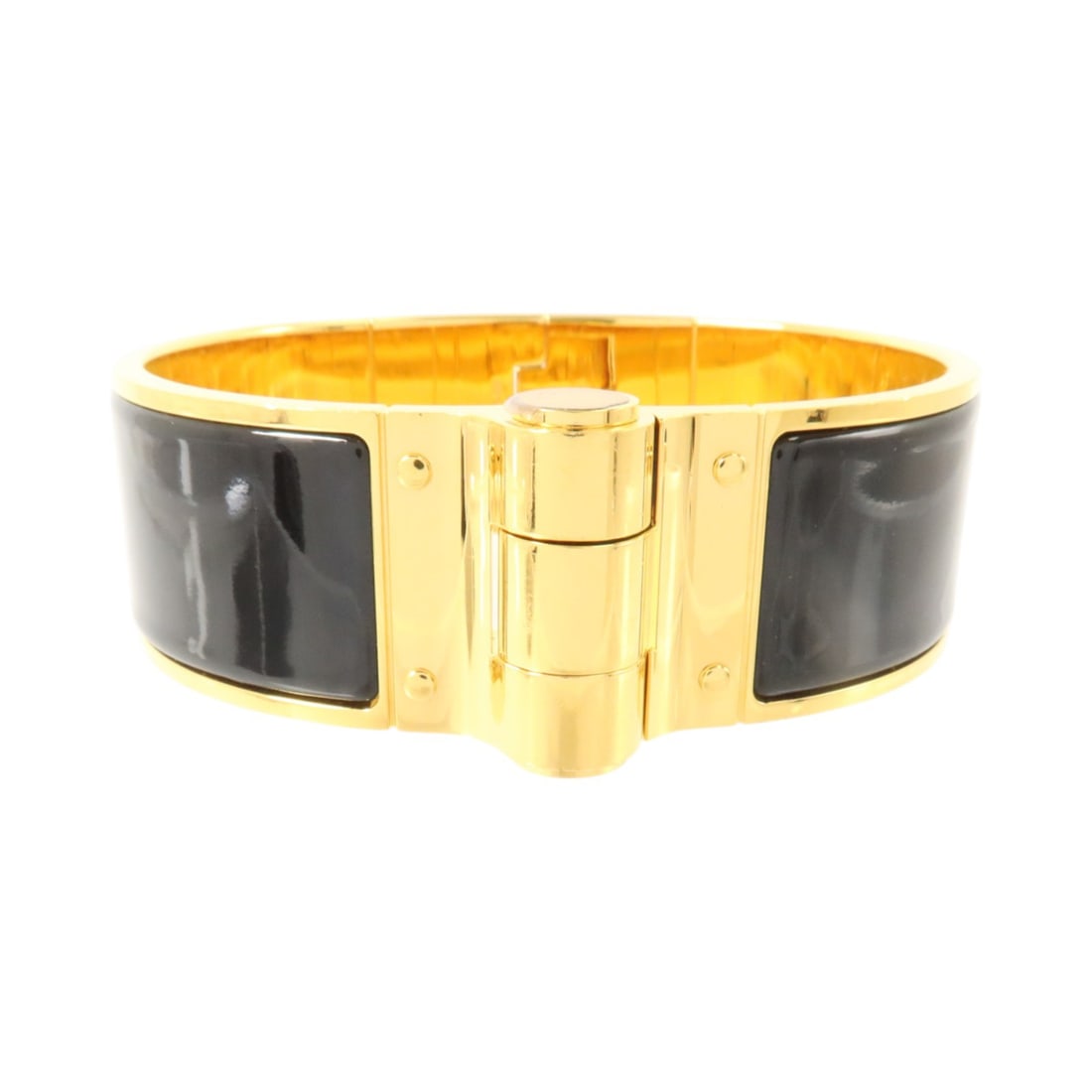 Hermes Charniere enamel bracelet black with gold tone metal: Hermes Charniere enamel bracelet black with gold tone metal Charniere bangle bracelet in black enamel with metal and gold-tone detailing. Includes storage bags. Condition is AB: Very Good. Specificati