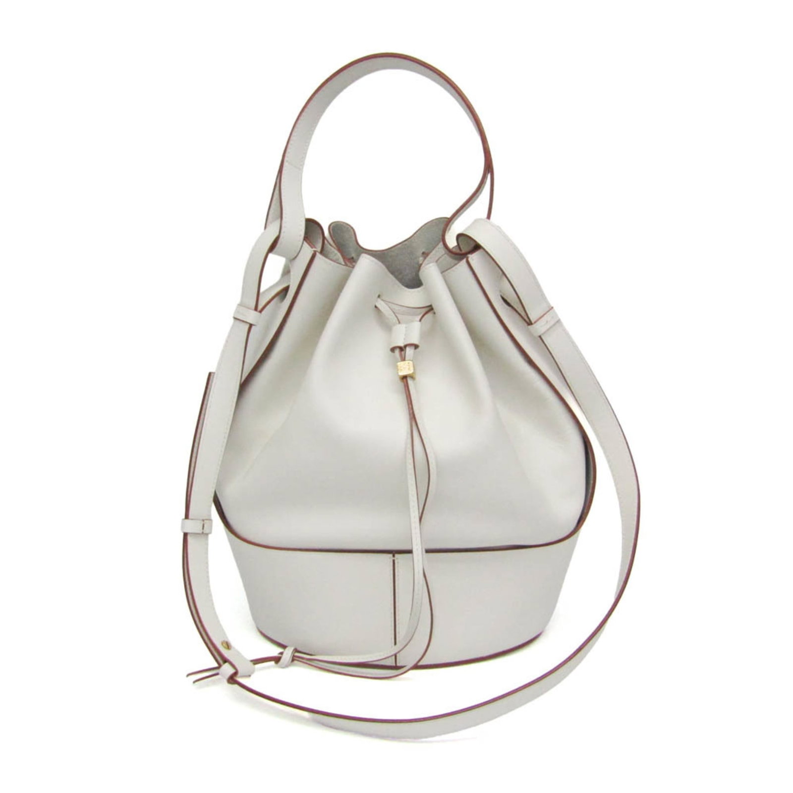 Loewe Balloon Bucket leather shoulder bag white: Loewe Balloon Bucket leather shoulder bag white The Loewe Balloon Bucket is a white leather handbag with a clean, structured silhouette. It is presented in excellent condition, with only minor signs o