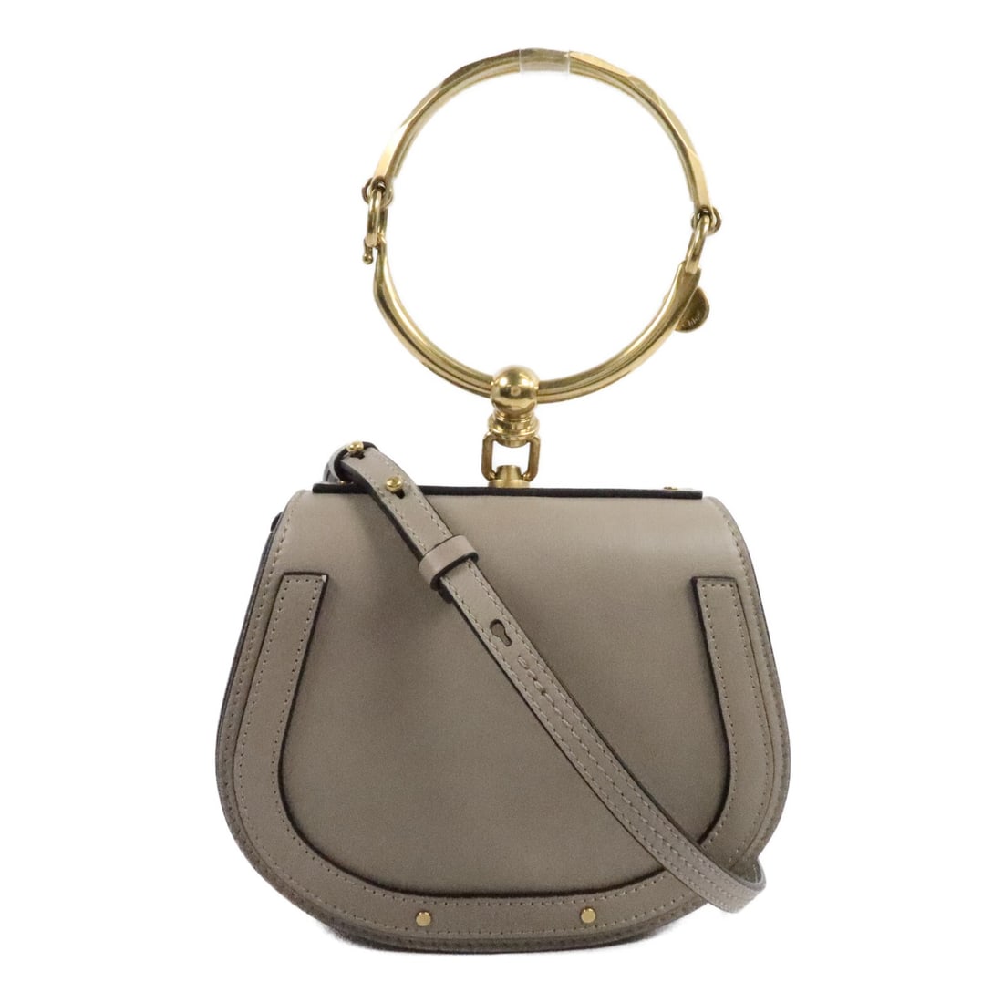 Chloe Nile beige calfskin 2 way shoulder bag with gold tone hardware: Chloe Nile beige calfskin 2 way shoulder bag with gold tone hardware Chloe Nile 2-way shoulder bag in beige calfskin leather with a structured silhouette and versatile carry options. This women's bag 