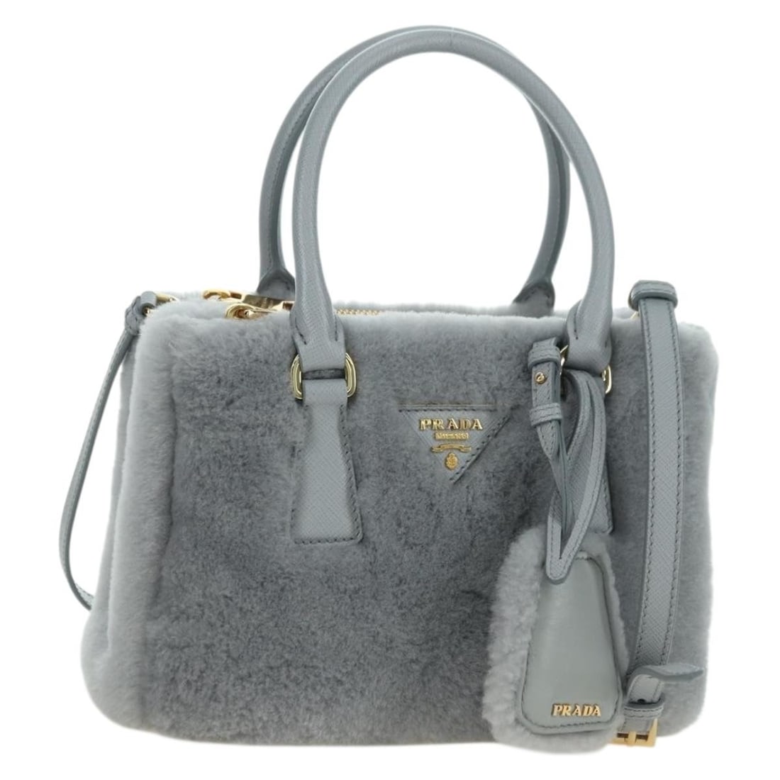 PRADA Montone Fur 2 Way Shoulder Bag Gray Gold: PRADA Montone Fur 2 Way Shoulder Bag Gray Gold Prada Montone faux fur Galleria shoulder bag in gray and gold, designed for women and made in Italy. This 2-way shoulder bag comes with a shoulder strap,