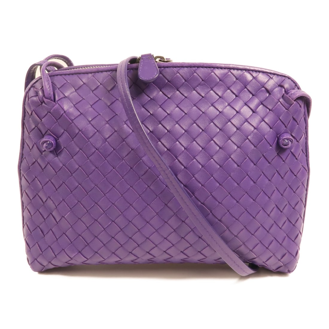 Bottega Veneta BV Purple Lambskin Crossbody Shoulder Bag: Bottega Veneta BV Purple Lambskin Crossbody Shoulder Bag A BOTTEGA VENETA crossbody shoulder bag crafted from lambskin (sheep leather) in purple. Designed for women, it features a regular size profile