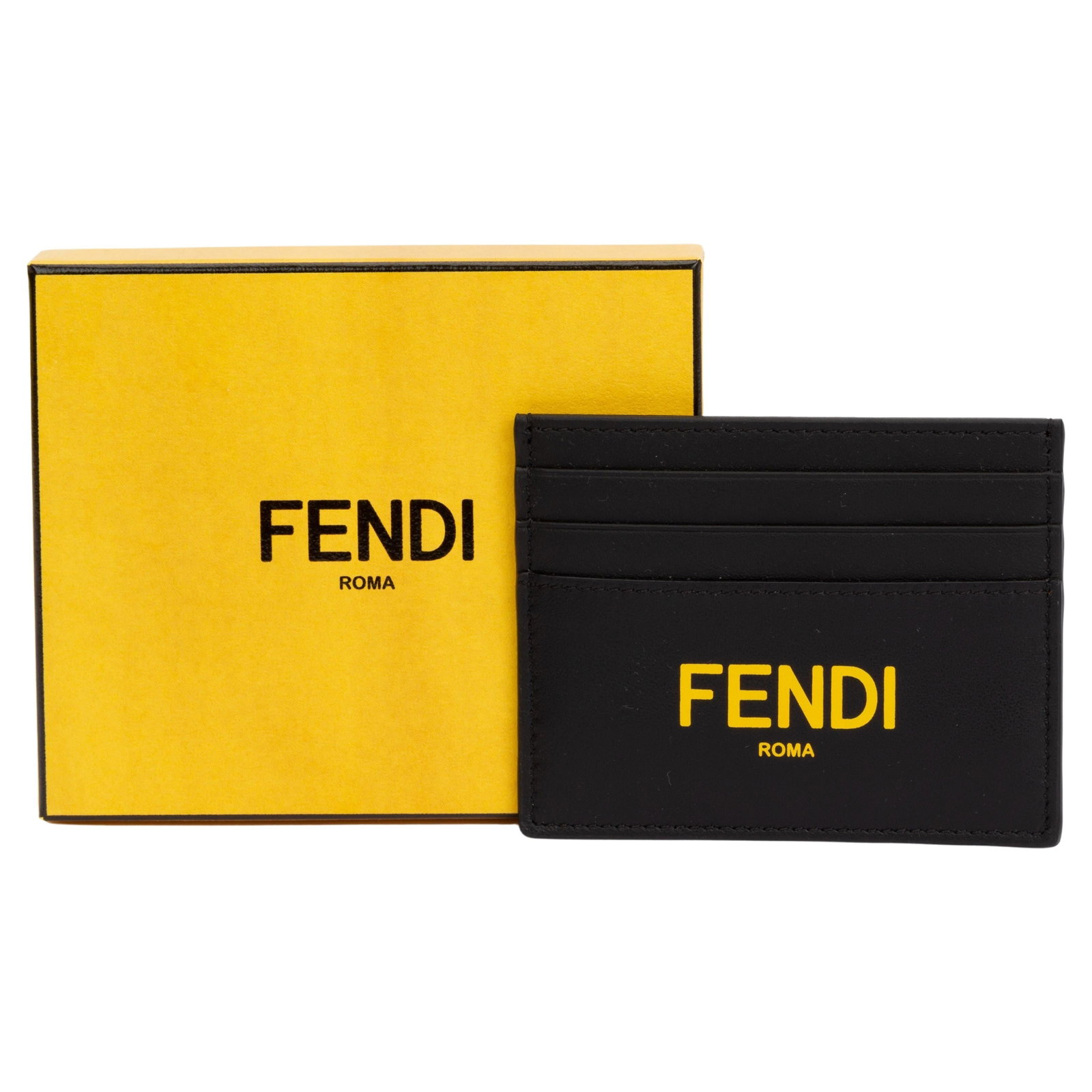 Fendi Black Leather Credit Card Case with Yellow Logo: Fendi Black Leather Credit Card Case with Yellow Logo This stylish Fendi black credit card case is the perfect accessory for the modern individual. Crafted from premium leather, it features the Fendi 