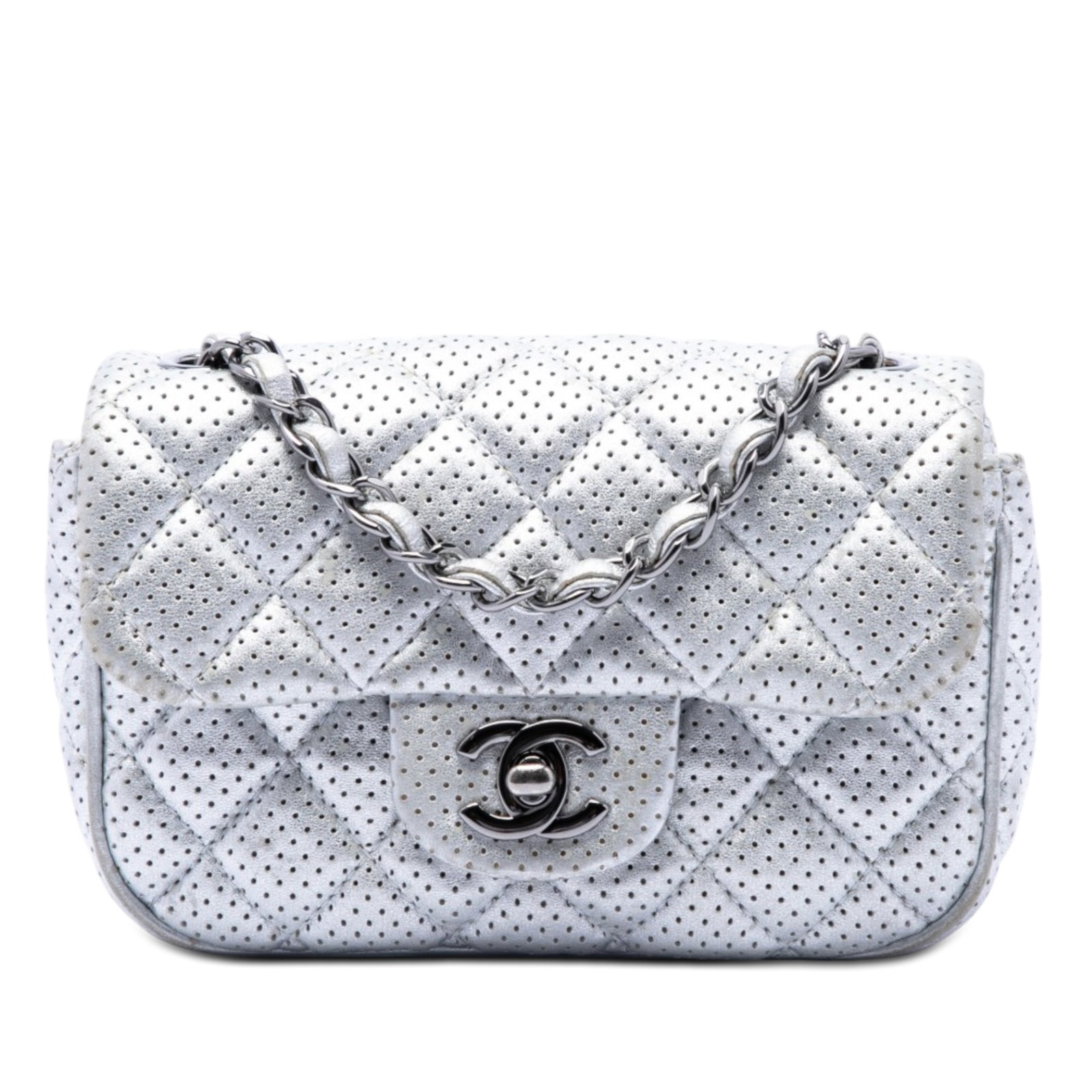 Chanel Mini Square Classic Single Flap Crossbody Perforated Lambskin: Chanel Mini Square Classic Single Flap Crossbody Perforated Lambskin Chanel Mini Square Classic Perforated Lambskin Single Flap crossbody bag in silver, made in Italy. It features a quilted lambskin l