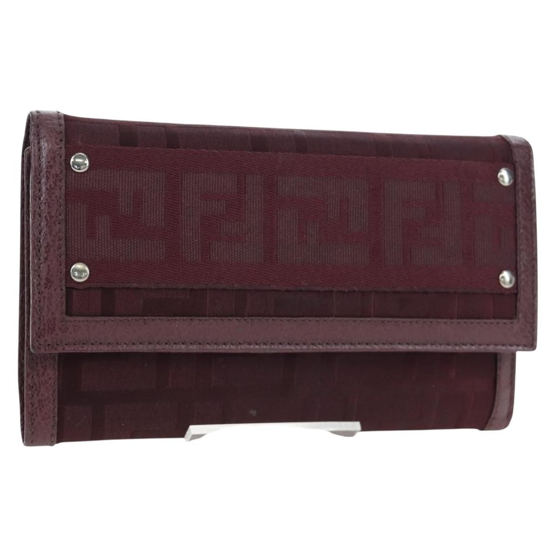 Fendi Trifold Wallet Zucca Canvas Nylon Bordeaux Silver Leather: Fendi Trifold Wallet Zucca Canvas Nylon Bordeaux Silver Leather Fendi trifold wallet in bordeaux Zucca canvas and nylon with silver-tone accents. Made in Italy, this women's wallet features a compact 