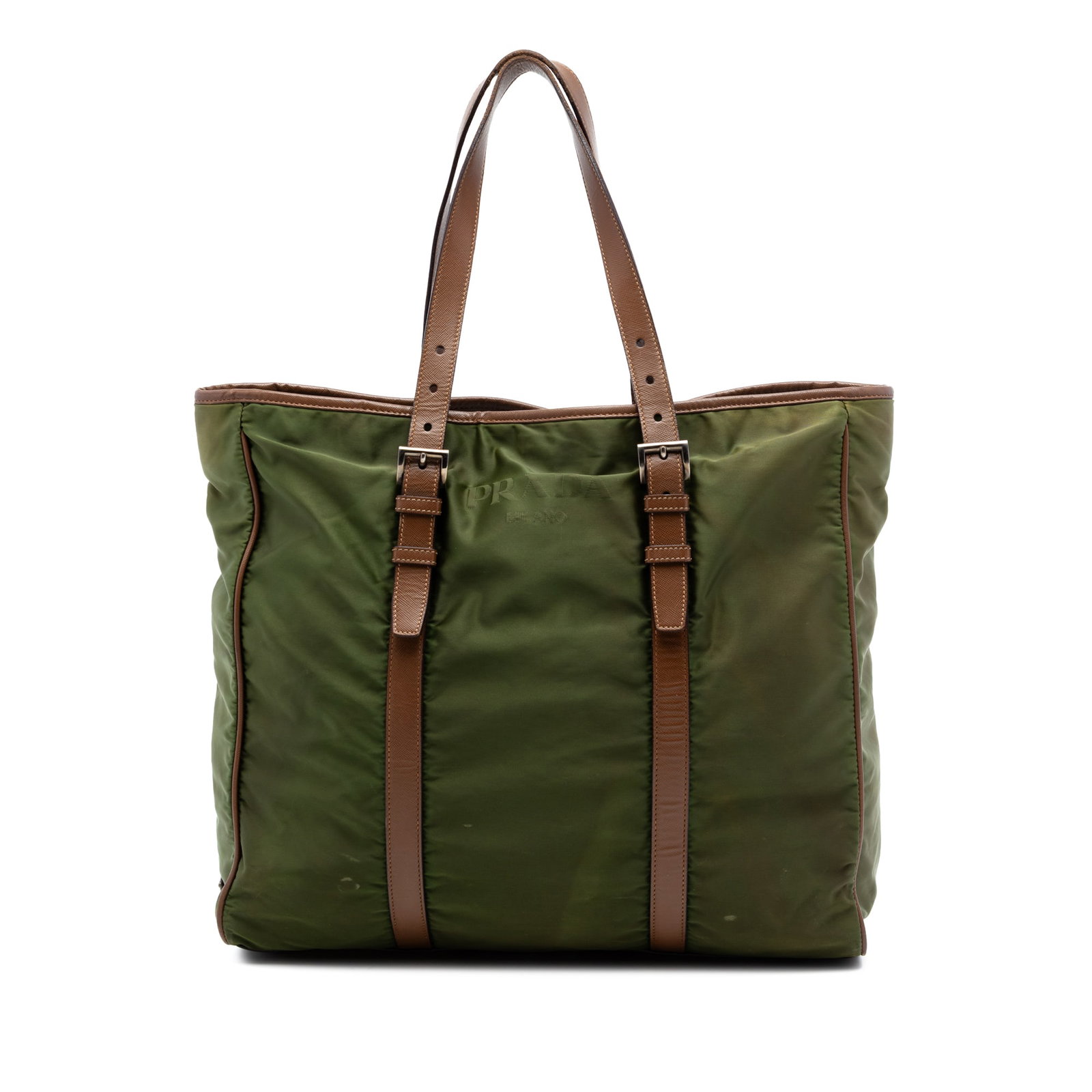 Prada green fabric tote with leather trim: Prada green fabric tote with leather trim This Prada Leather Trimmed Tessuto Tote features a combination of leather and nylon for both durability and style. The bag is designed with adjustable flat le