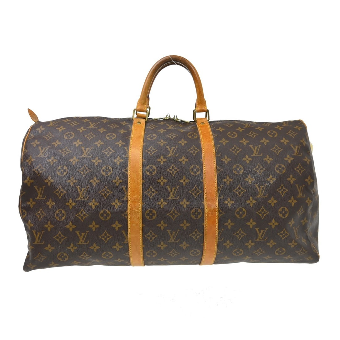 Louis Vuitton Keepall Travel Bag in Brown Monogram Canvas: Louis Vuitton Keepall Travel Bag in Brown Monogram Canvas Louis Vuitton Keepall in brown monogram canvas. This unisex bag is made in France and is presented in fair condition with visible wear. The ex