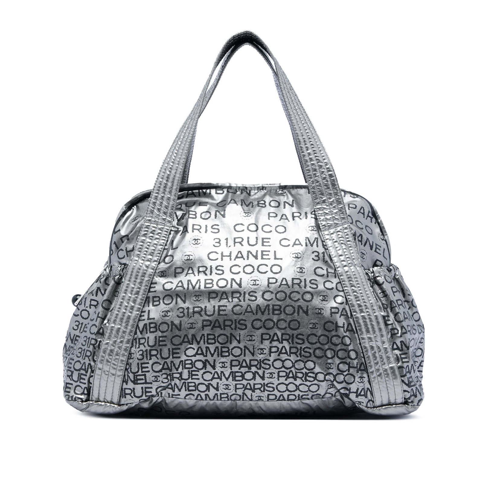 Chanel Unlimited Ligne Metallic Coated Canvas Zip Tote Bag: Chanel Unlimited Ligne Metallic Coated Canvas Zip Tote Bag Chanel Unlimited Ligne tote in metallic coated canvas with flat straps, a top zip closure, exterior side slip pockets, and interior zip and s