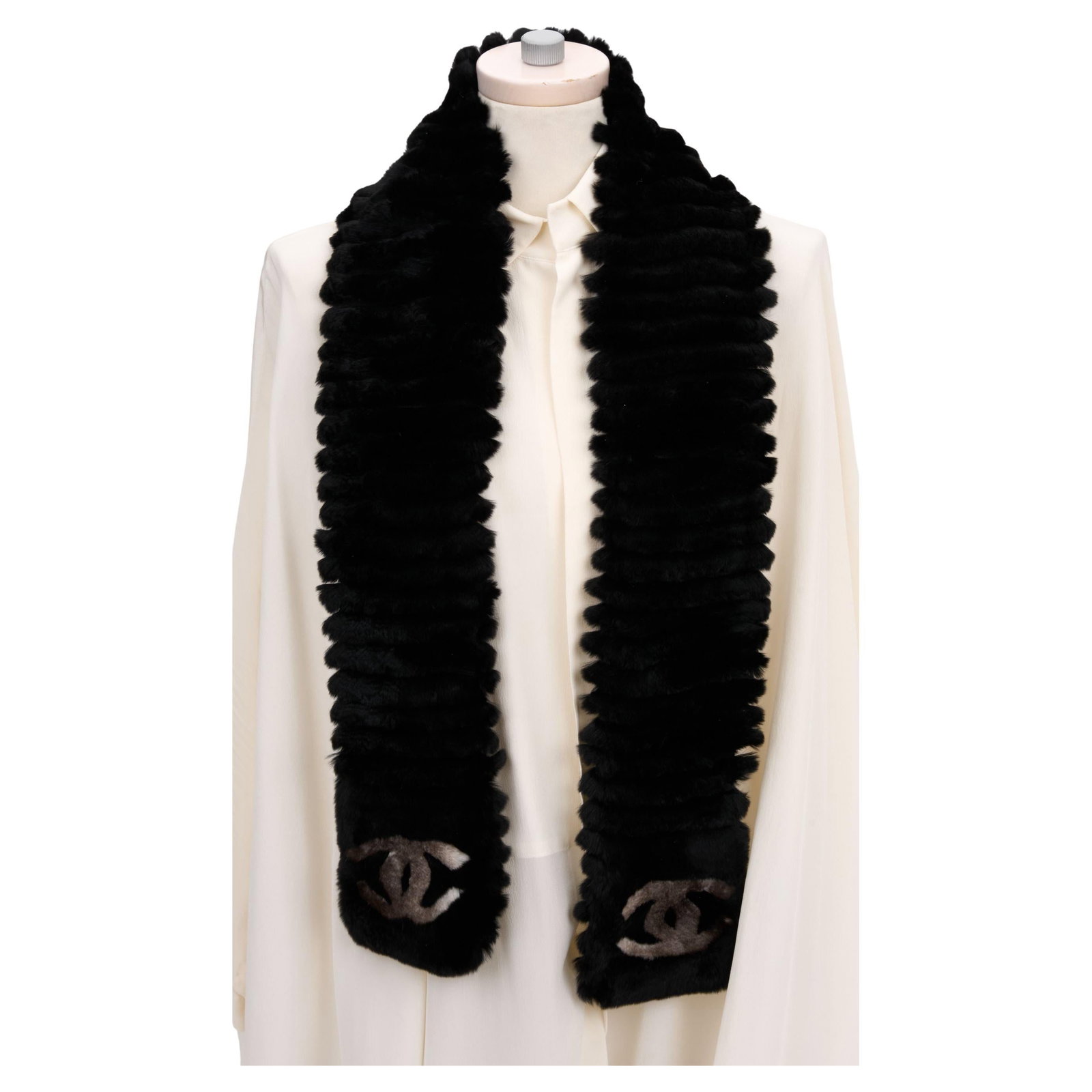 Chanel CC Scarf Black Grey Orylag Fur Cashmere 52 in: Chanel CC Scarf Black Grey Orylag Fur Cashmere 52 in Elevate your style with this exquisite Chanel Chincilla Orylag Fur CC Scarf. Crafted with a luxurious blend of 70% Orylag rabbit fur and 30% cashme