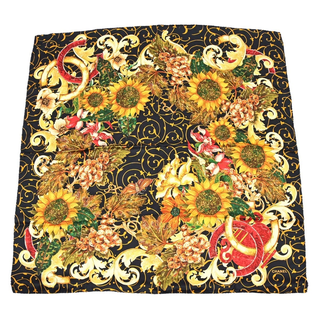 CHANEL Silk Square Scarf Black Sunflower Motif Italy: CHANEL Silk Square Scarf Black Sunflower Motif Italy This CHANEL women's scarf is made from 100% silk and features a black color with gold and other accents. It is in very good condition with visible 