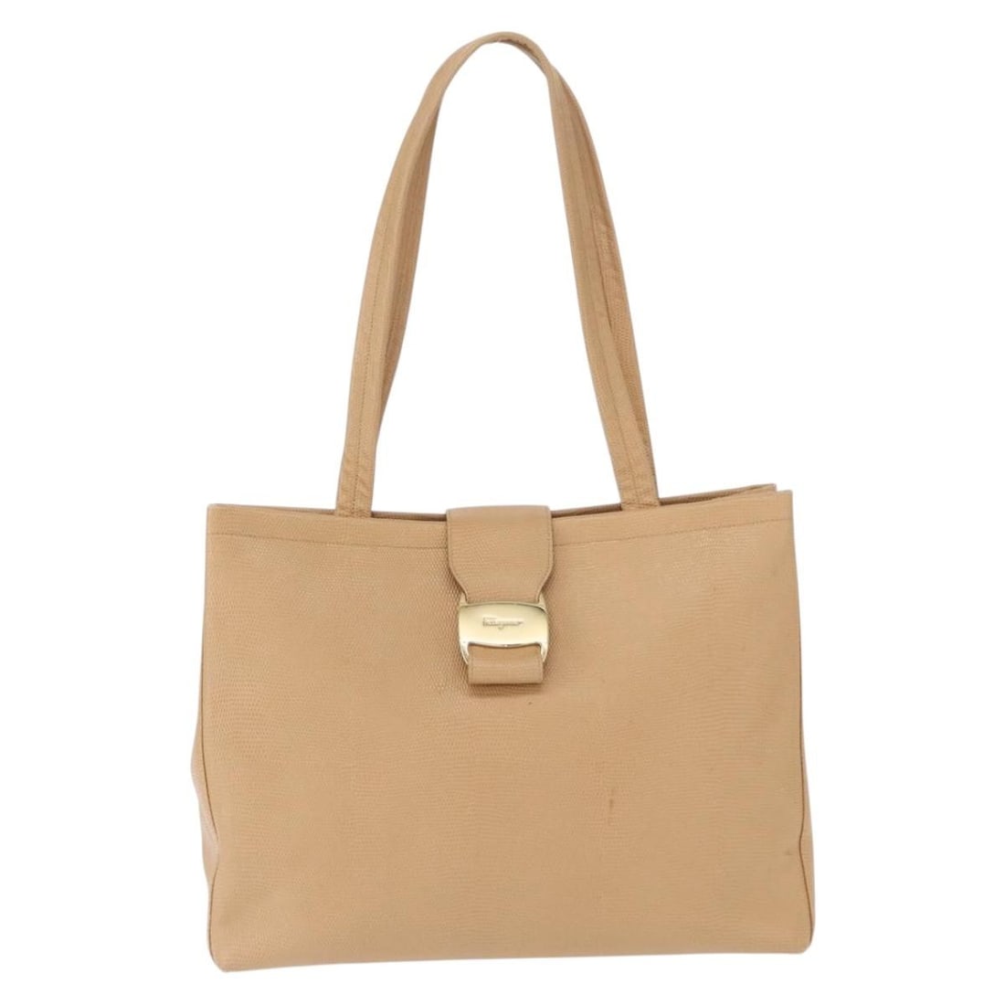 Beige Leather Vala Tote by Salvatore Ferragamo Italy: Beige Leather Vala Tote by Salvatore Ferragamo Italy This Salvatore Ferragamo Vala tote is crafted from beige leather and designed for women. Made in Italy, it features a spacious interior and sturdy 