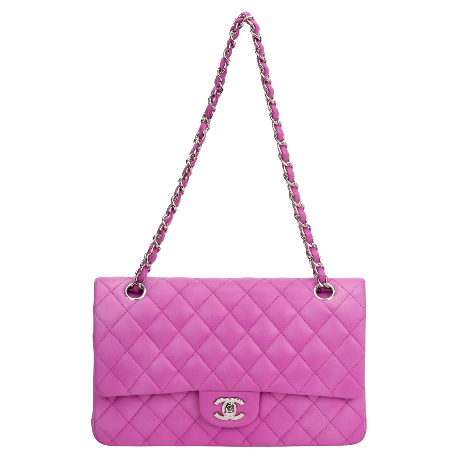 Chanel Classic Medium Double Flap Bag with Authenticity Card: Chanel Classic Medium Double Flap Bag with Authenticity Card This Chanel Classic Medium Double Flap Bag is a stunning accessory crafted from luxurious lambskin leather. The bag features striking silve
