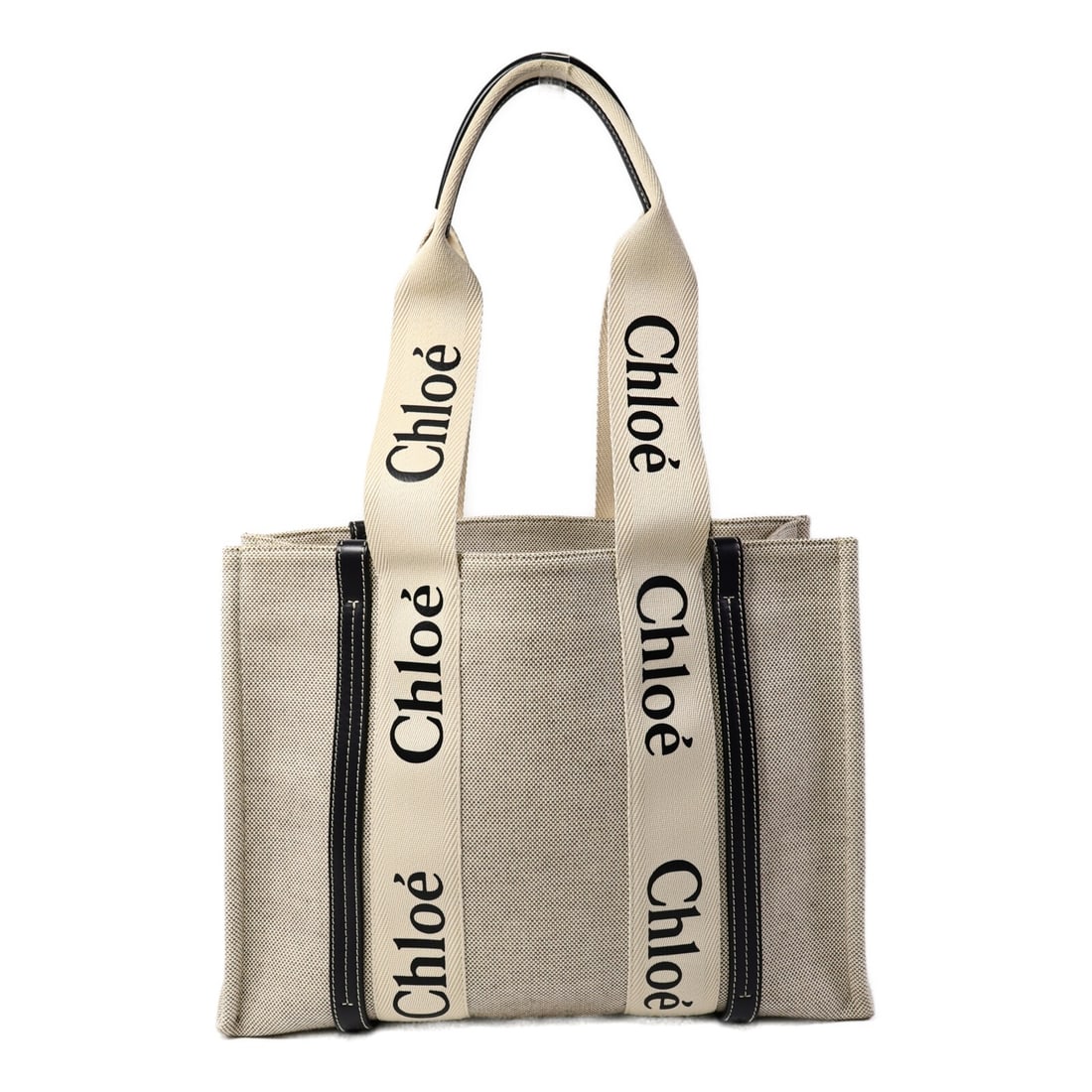 Chloe Woody Medium Canvas Tote Bag in Black: Chloe Woody Medium Canvas Tote Bag in Black Chloe Woody medium tote bag in black canvas, designed for women and presented in very good AB condition. It features a regular size profile, black exterior 