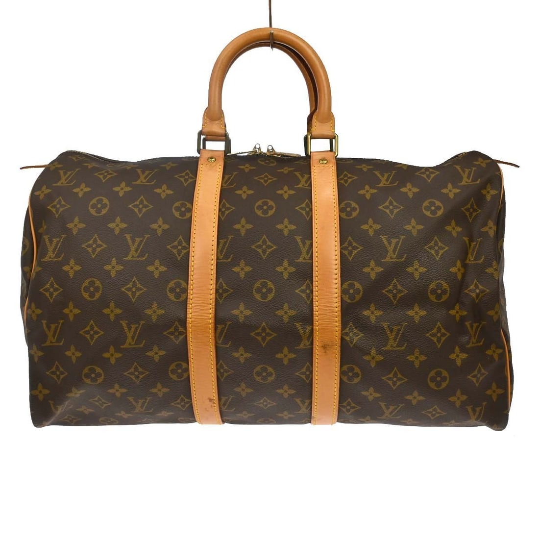 Louis Vuitton Keepall Brown Monogram Canvas Travel Bag: Louis Vuitton Keepall Brown Monogram Canvas Travel Bag Louis Vuitton Keepall in brown monogram canvas. This unisex bag is made in France and remains in good condition with visible wear from use. The e