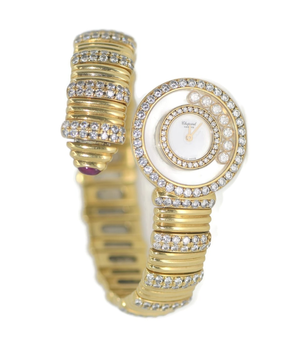Chopard Happy Diamonds 4113 Snake Wristwatch in 18K Yellow Gold: Chopard Happy Diamonds 4113 Snake Wristwatch in 18K Yellow Gold Pre-owned Chopard Happy Diamonds Snake wristwatch featuring an analog white dial, round case, quartz movement, and diamond bezel. This w