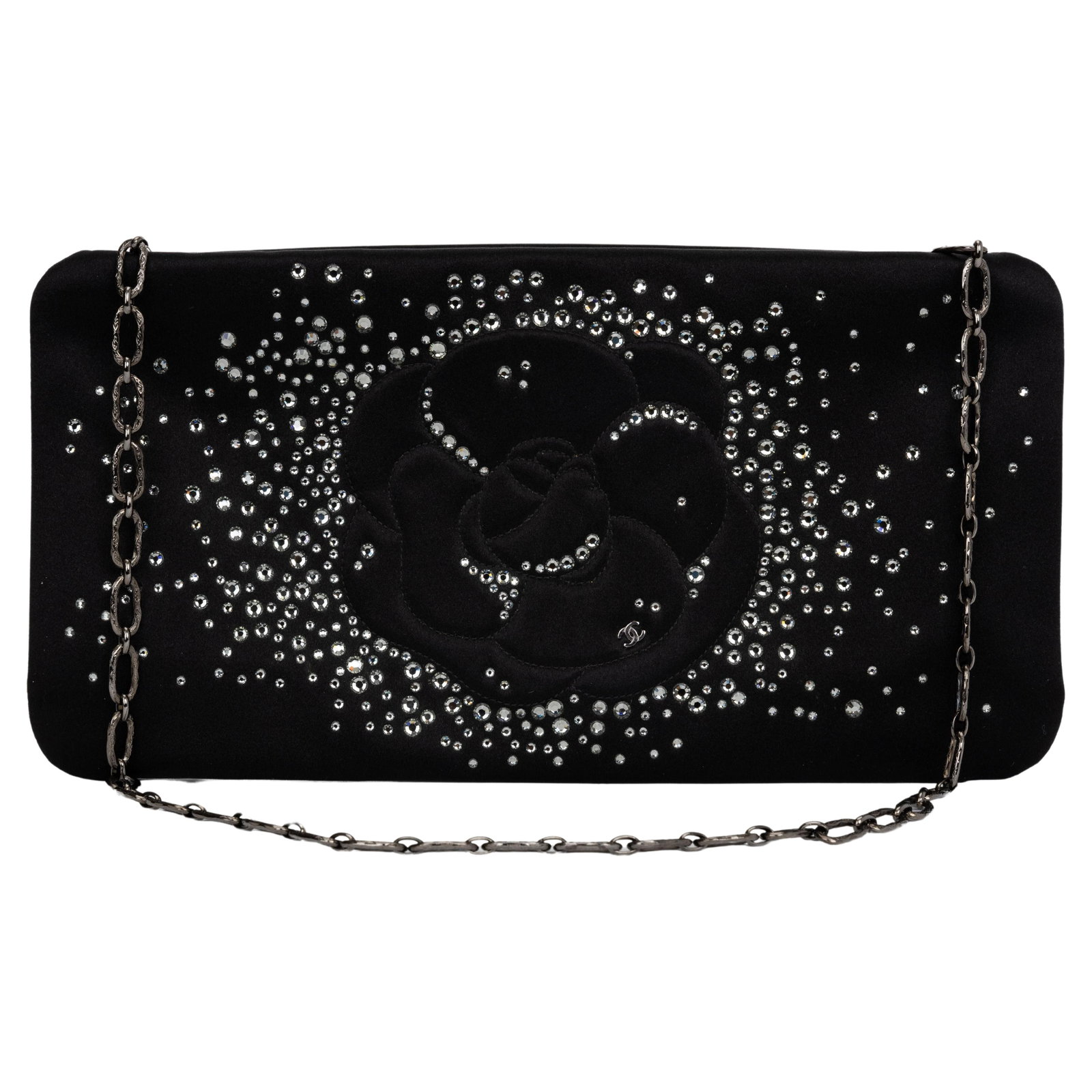 Chanel Black Satin Clutch Spring/Summer 2010 with Crystal Embellishments: Chanel Black Satin Clutch Spring/Summer 2010 with Crystal Embellishments This elegant Chanel Black Satin Strass Camellia Clutch is a stunning accessory from the Spring/Summer 2010 Collection by Karl L
