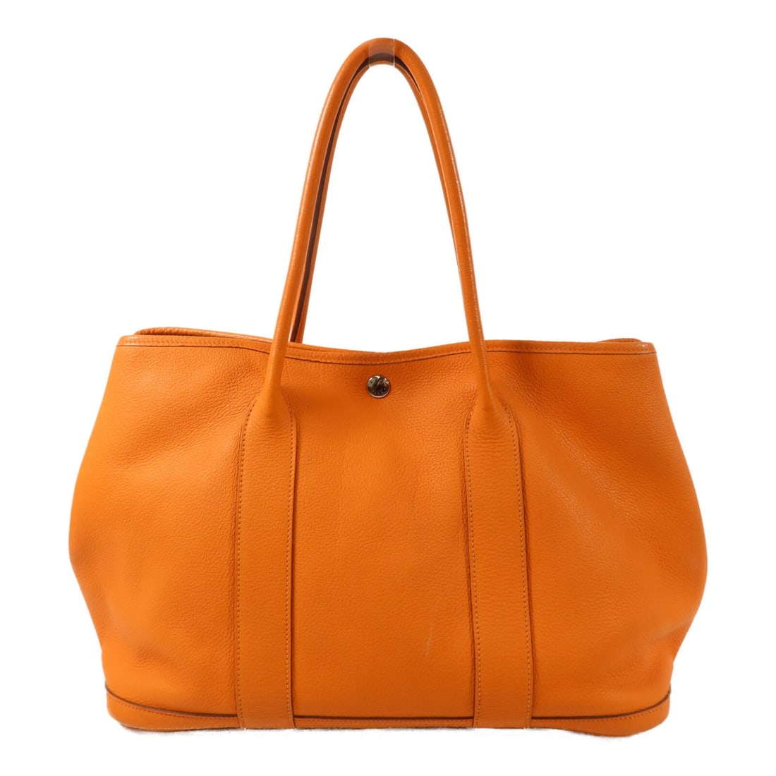 Hermes Garden Party PM Orange Leather Handbag with PHW: Hermes Garden Party PM Orange Leather Handbag with PHW Hermes Garden Party PM handbag in orange leather with palladium-tone hardware. This women's handbag is made in France and features a hook-button 