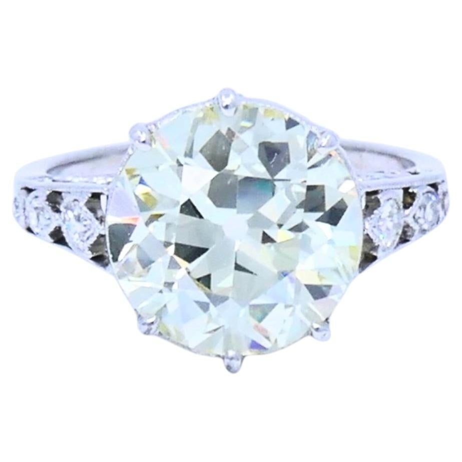 Platinum Art Deco Solitaire Ring with Old European Cut Diamond: Platinum Art Deco Solitaire Ring with Old European Cut Diamond Art Deco solitaire engagement ring made of platinum, centered with a 3.46-carat Old European cut diamond and accented with single cut dia