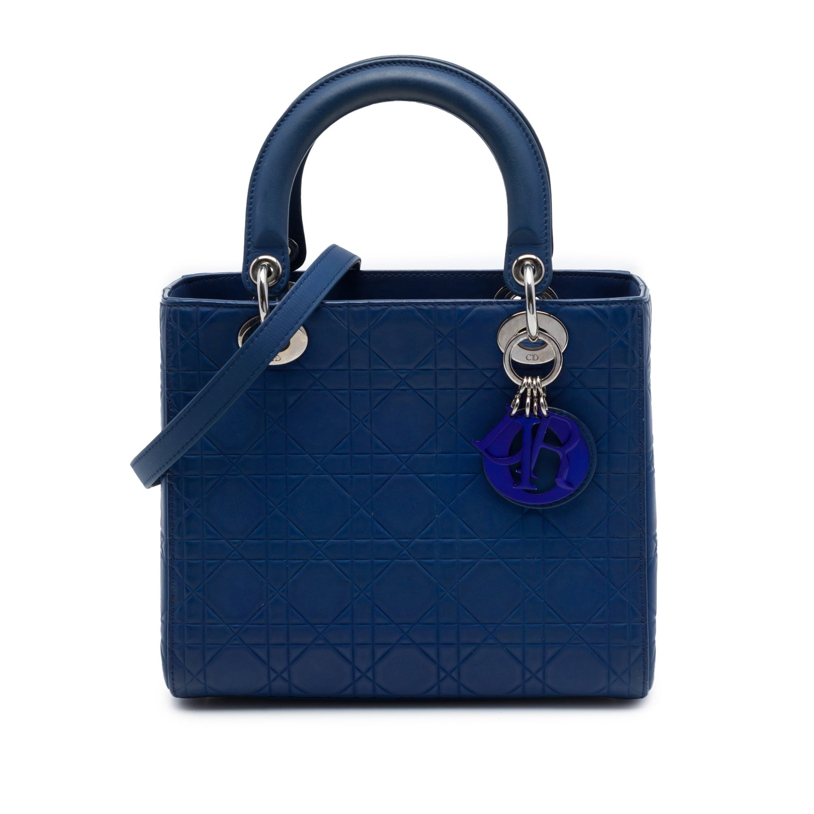 Dior Lady Dior Medium Blue Calfskin Cannage Handbag: Dior Lady Dior Medium Blue Calfskin Cannage Handbag Medium Lady Dior bag in blue ultra matte calfskin with embossed Cannage detailing. This Italian-made bag features flat leather top handles, a detach