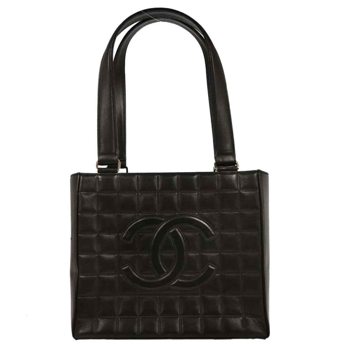 Chanel Chocolate Bar CC Tote Bag Black Leather: Chanel Chocolate Bar CC Tote Bag Black Leather Chanel Chocolate Bar CC Tote in black quilted leather. This women's tote is made in Italy and is presented in good condition, with light scratching noted