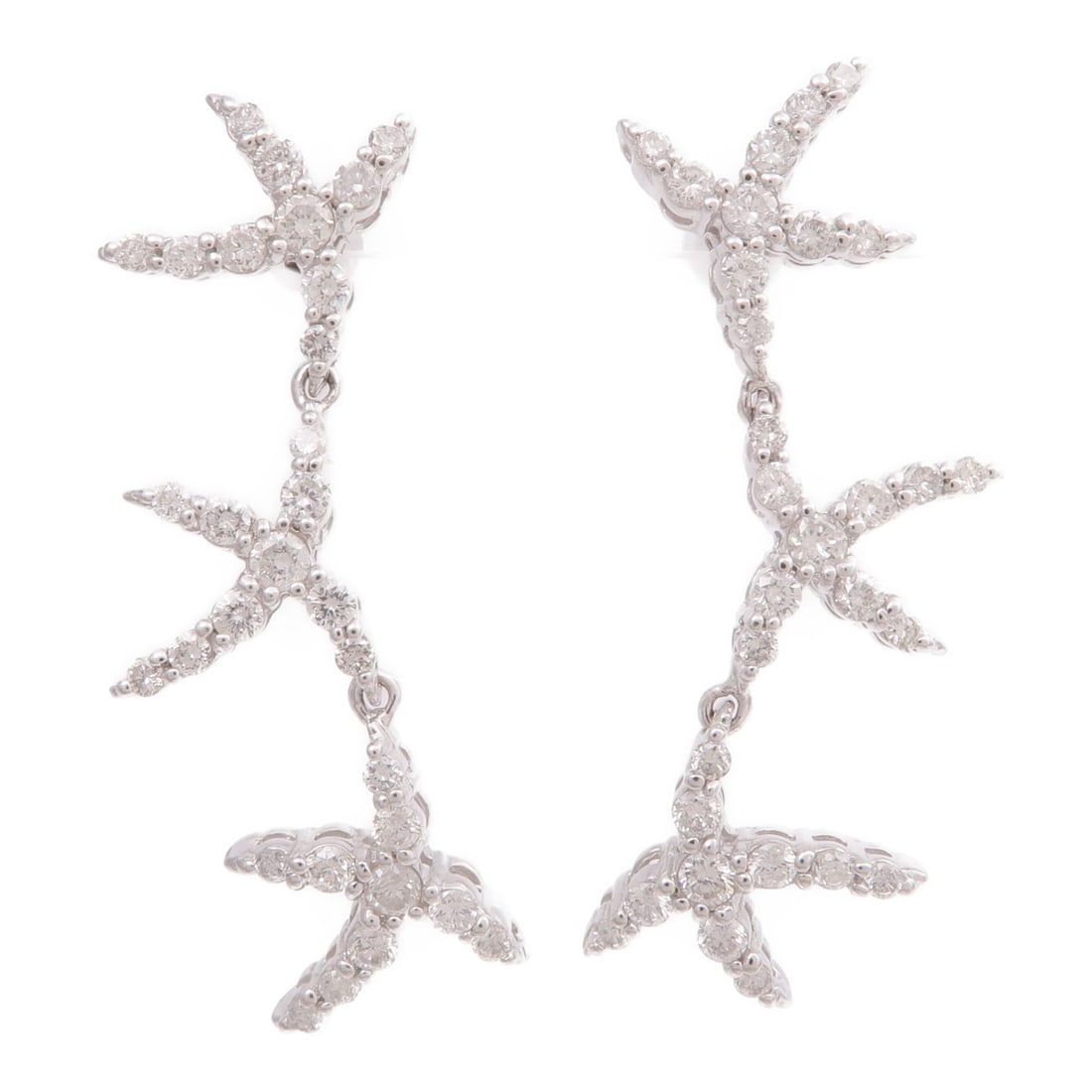 Pierced Diamond Earrings in 18K White Gold: Pierced Diamond Earrings in 18K White Gold Pierced diamond earrings in 18K white gold with a clear finish and diamond accents. Designed for women, these earrings measure 38 mm x 8 mm and weigh 5.5 g. 
