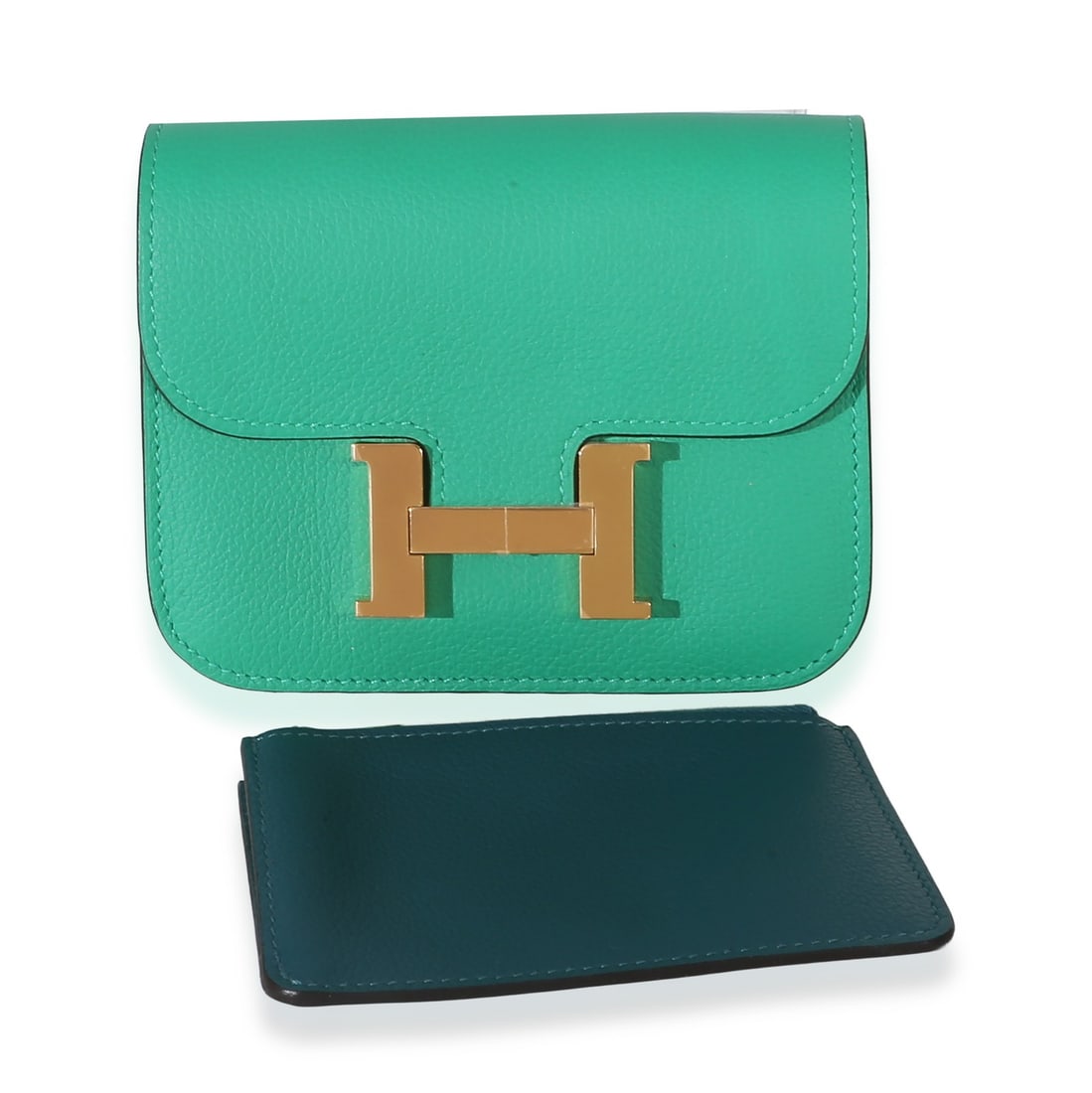 Hermes Constance Slim Wallet Evercolor Leather Green Gold Tone: Hermes Constance Slim Wallet Evercolor Leather Green Gold Tone Pre-owned Hermes Constance Slim Wallet in green Evercolor leather with a bicolore design. This unisex wallet features a magnetic snap clo