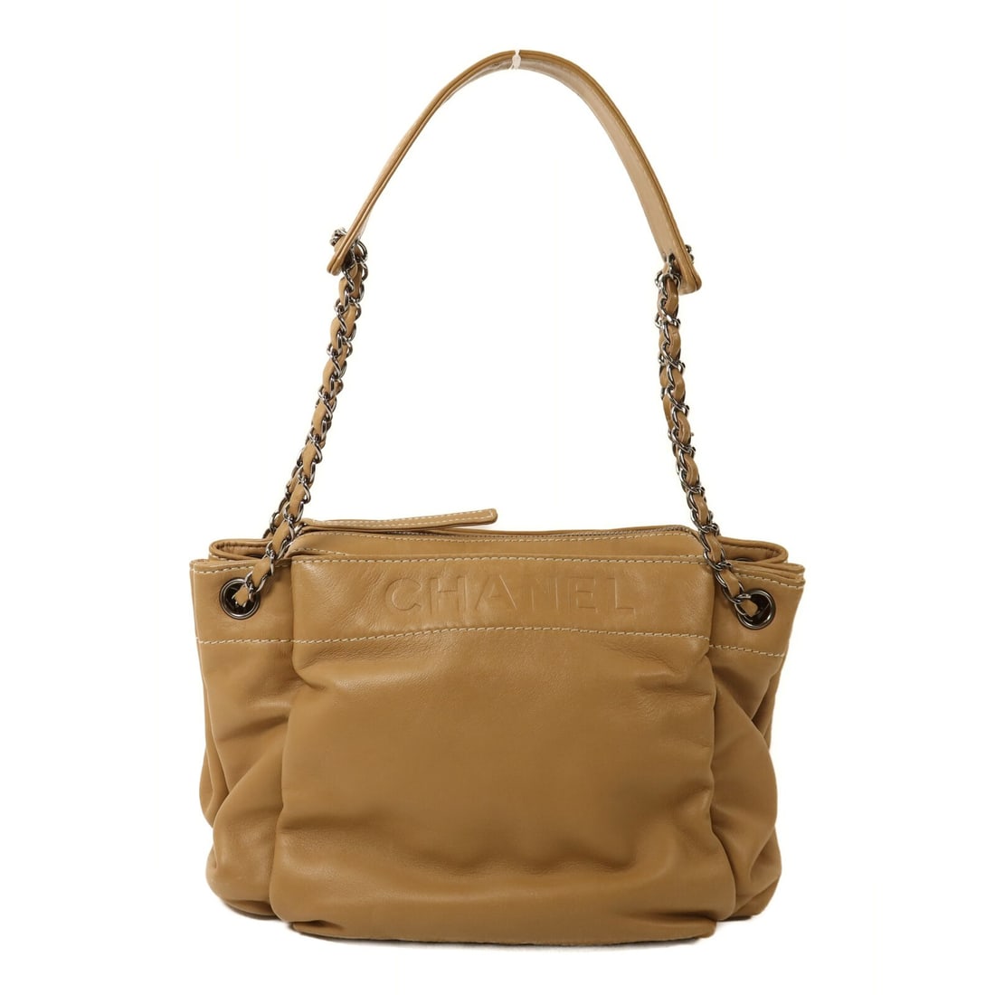 CHANEL CC Beige Lambskin Shoulder Bag with Silver Tone Chain: CHANEL CC Beige Lambskin Shoulder Bag with Silver Tone Chain A CHANEL CC SHW chain shoulder bag in beige lambskin (sheep leather). This women's regular-size shoulder bag is made in France and features
