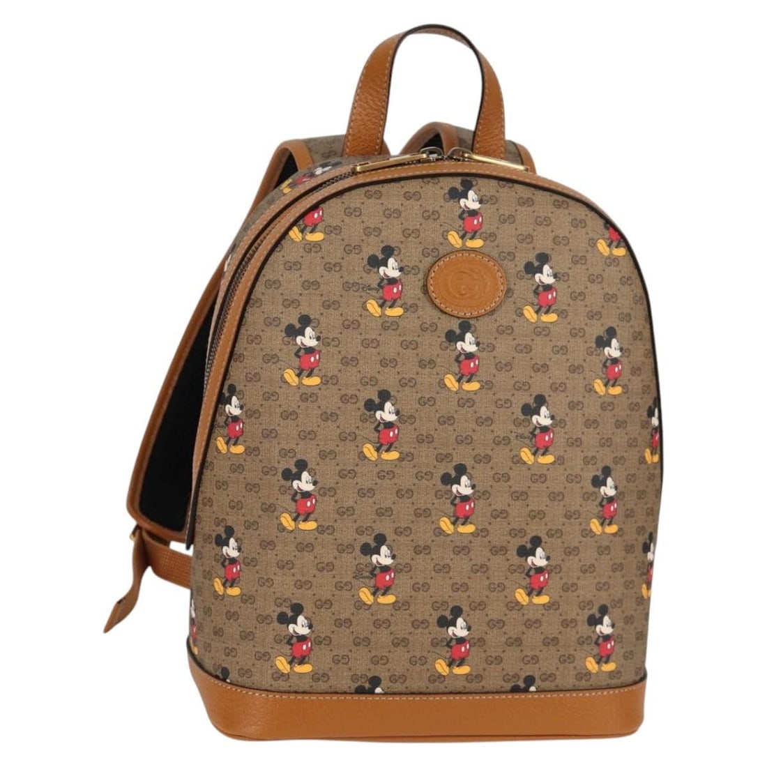 Gucci 552884 Disney Collaboration Micro GG Supreme PVC Backpack: Gucci 552884 Disney Collaboration Micro GG Supreme PVC Backpack Gucci Micro GG Supreme Disney Collaboration backpack in beige and gold PVC leather with Micro Small GG canvas. Made in Italy, this women