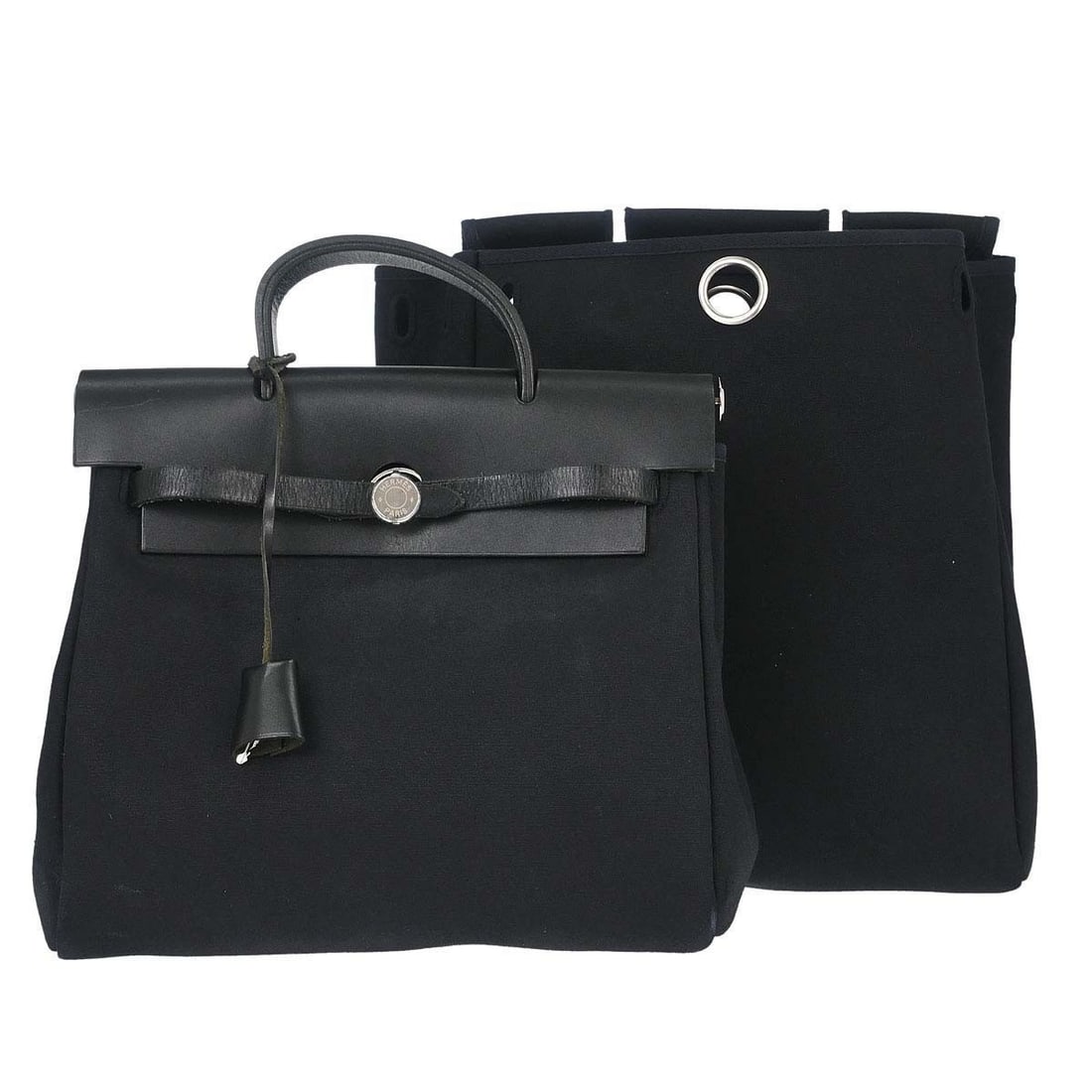 Hermes Herbag a Dos 2 in 1 black Toile Officier backpack: Hermes Herbag a Dos 2 in 1 black Toile Officier backpack Vintage Hermes Herbag a Dos 2 in 1 backpack in black Toile Officier and leather. This medium backpack features a convertible design with two he