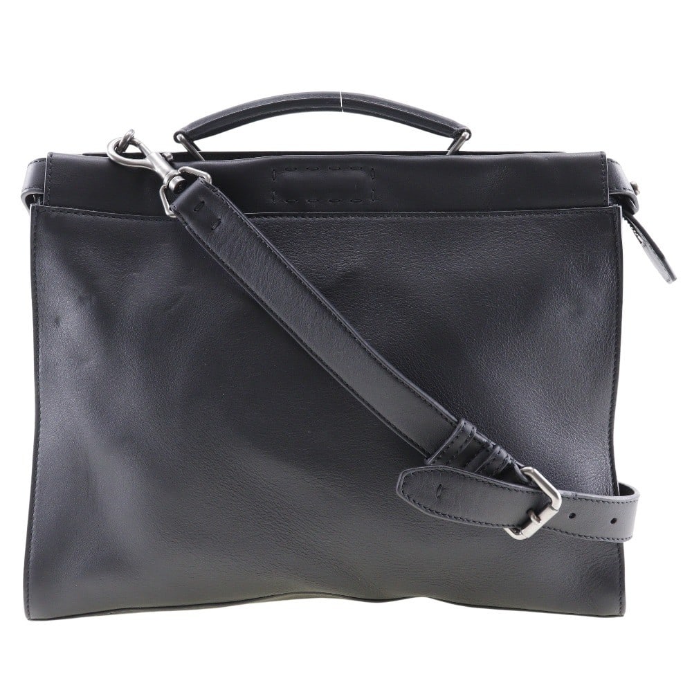 Fendi Peekaboo Iconic Fit Black Leather Men's Bag: Fendi Peekaboo Iconic Fit Black Leather Men's Bag The Fendi Peekaboo Iconic Fit Bag is crafted from black leather and designed for men. This bag features a spacious interior and a sleek silhouette. Ma