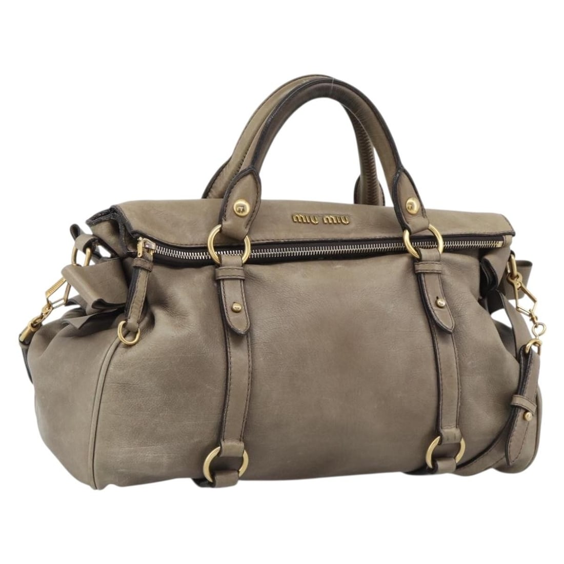 Miu Miu Brown Leather 2 Way Handbag with Strap Dust Bag: Miu Miu Brown Leather 2 Way Handbag with Strap Dust Bag Miu Miu 2-way handbag in brown leather with gold-tone accents. This women's bag includes a dust bag and shoulder strap, and can be carried by th