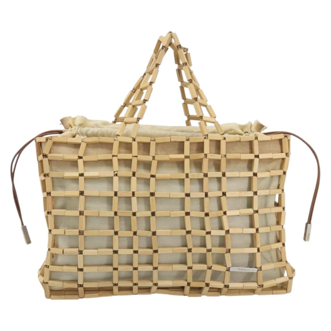Salvatore Ferragamo Wood Mesh Drawstring Canvas Handbag Beige: Salvatore Ferragamo Wood Mesh Drawstring Canvas Handbag Beige Salvatore Ferragamo Wood Mesh Drawstring canvas bag in beige. This women's bag is made in Italy and remains in good overall condition, sho