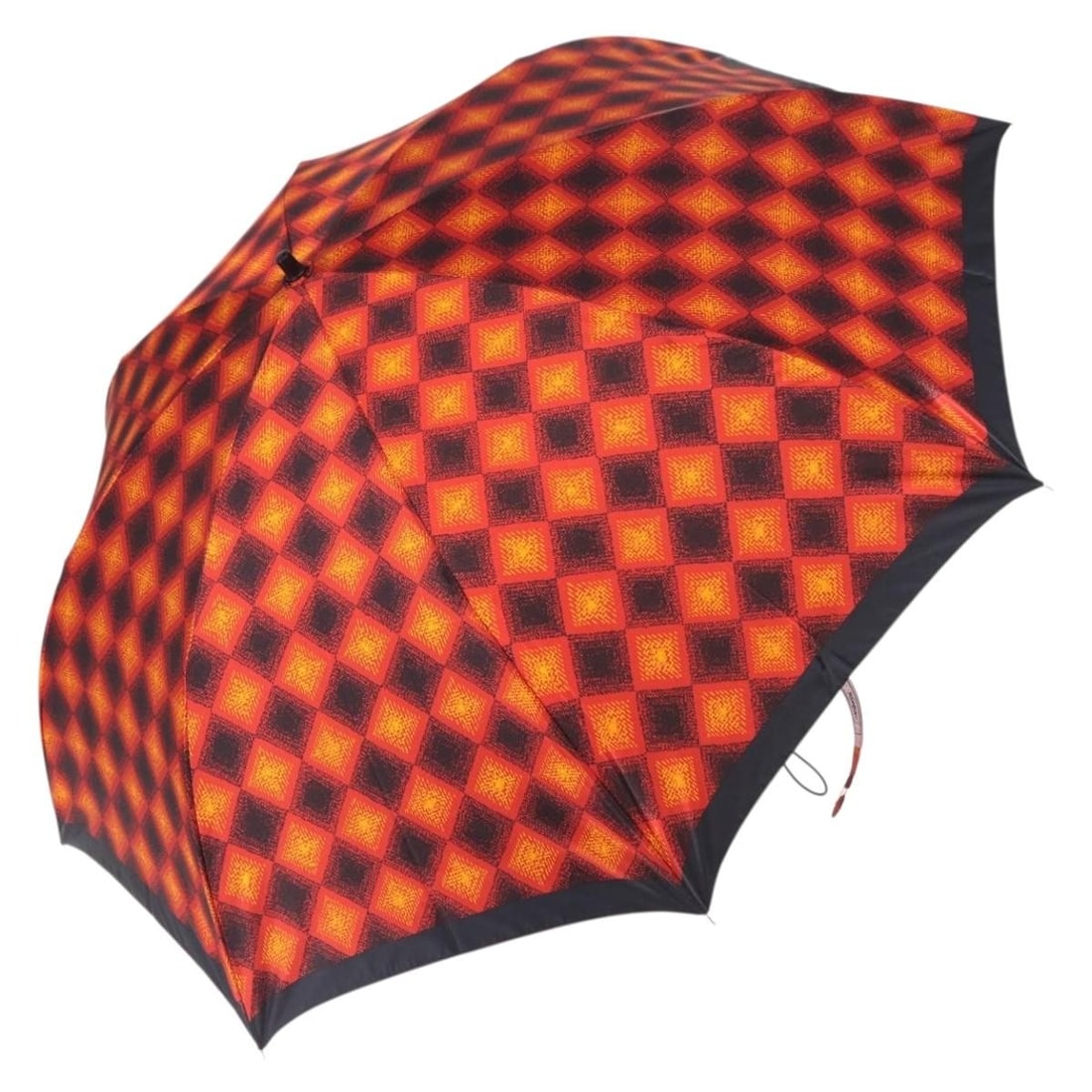 Red Gold Polyester Folding Umbrella by Saint Laurent: Red Gold Polyester Folding Umbrella by Saint Laurent A folding umbrella by Saint Laurent, made of polyester in a red and gold colorway. It is a women's accessory with a rib length of approximately 58 