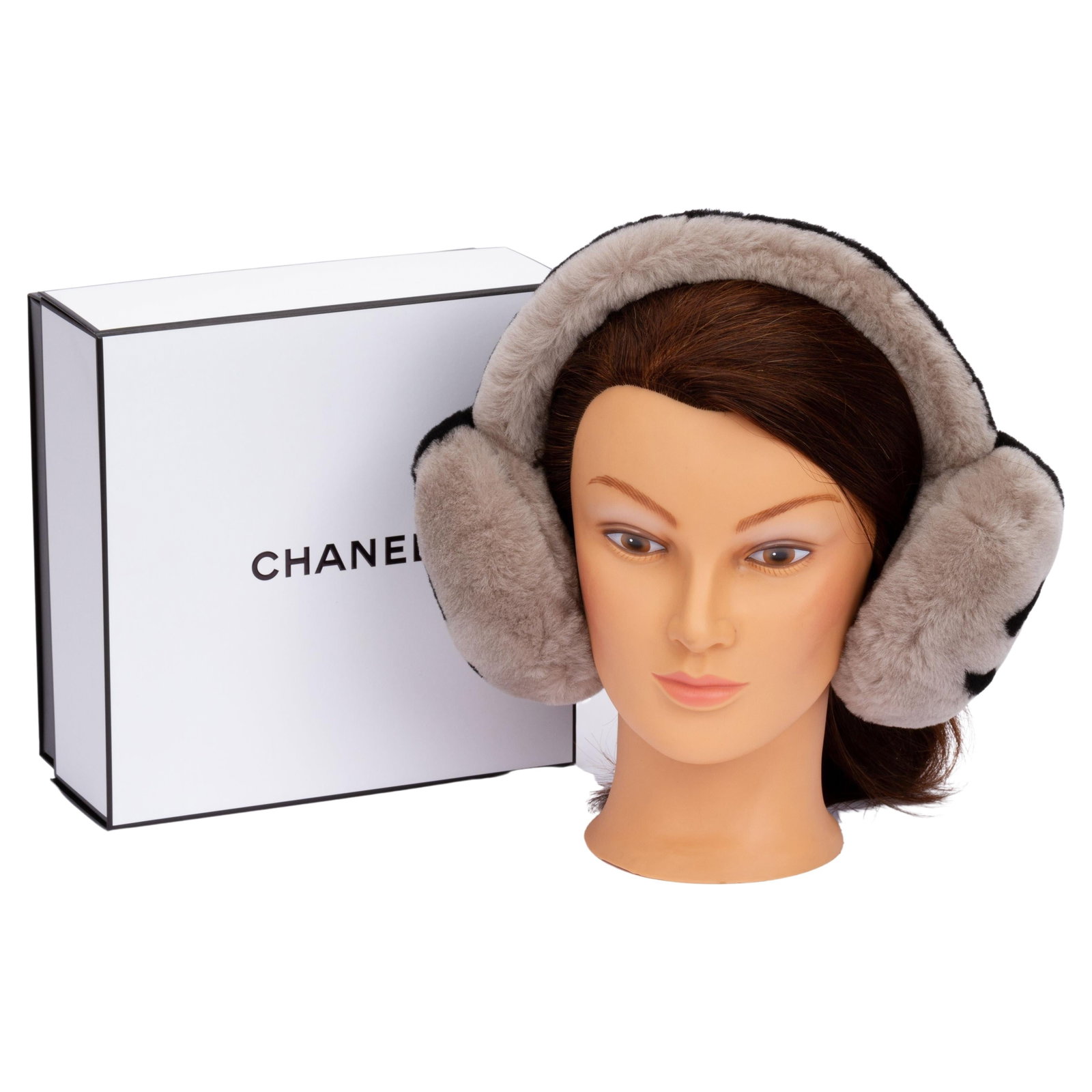 Chanel Shearling Ear Muffs Taupe Black BNIB with CC Logo: Chanel Shearling Ear Muffs Taupe Black BNIB with CC Logo Experience luxury and warmth with these Chanel ear muffs, designed in elegant taupe and black. Crafted from premium shearling, these earmuffs f