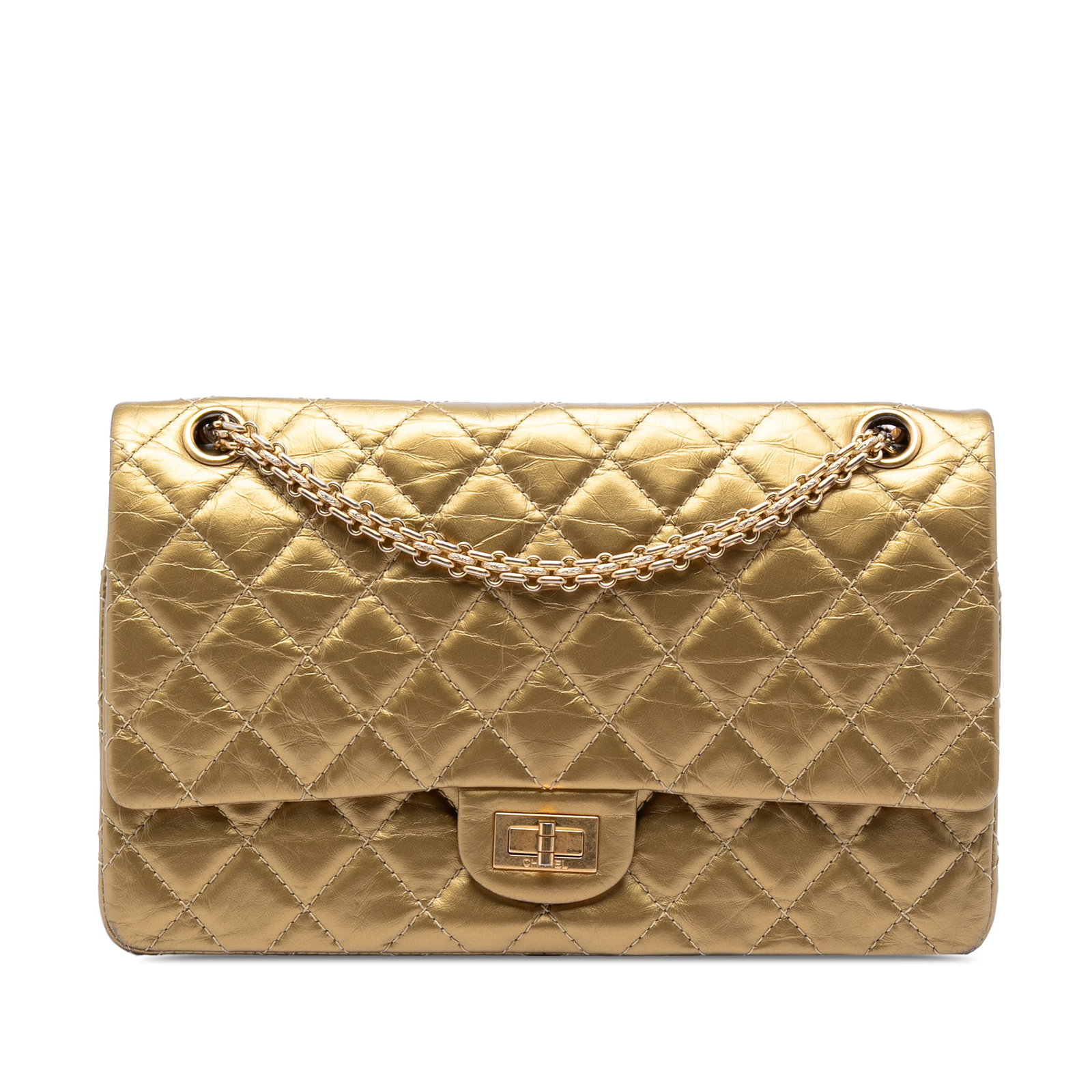 Chanel Reissue 2.55 metallic quilted calfskin double flap bag: Chanel Reissue 2.55 metallic quilted calfskin double flap bag This Chanel Reissue 2.55 Double Flap 226 shoulder bag features a quilted metallic aged calfskin leather body in gold, complemented by chai