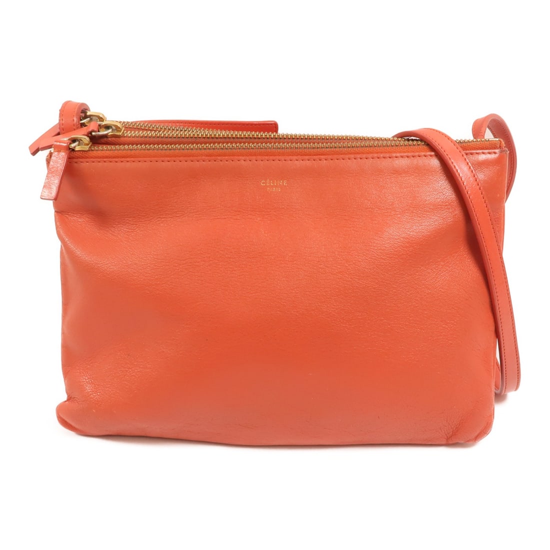 CELINE Trio Large Red Lambskin Shoulder Bag: CELINE Trio Large Red Lambskin Shoulder Bag CELINE Trio Large Shoulder Bag in red lambskin leather with gold-tone hardware. It features a compact profile with a shoulder strap length of 94 to 114 cm a